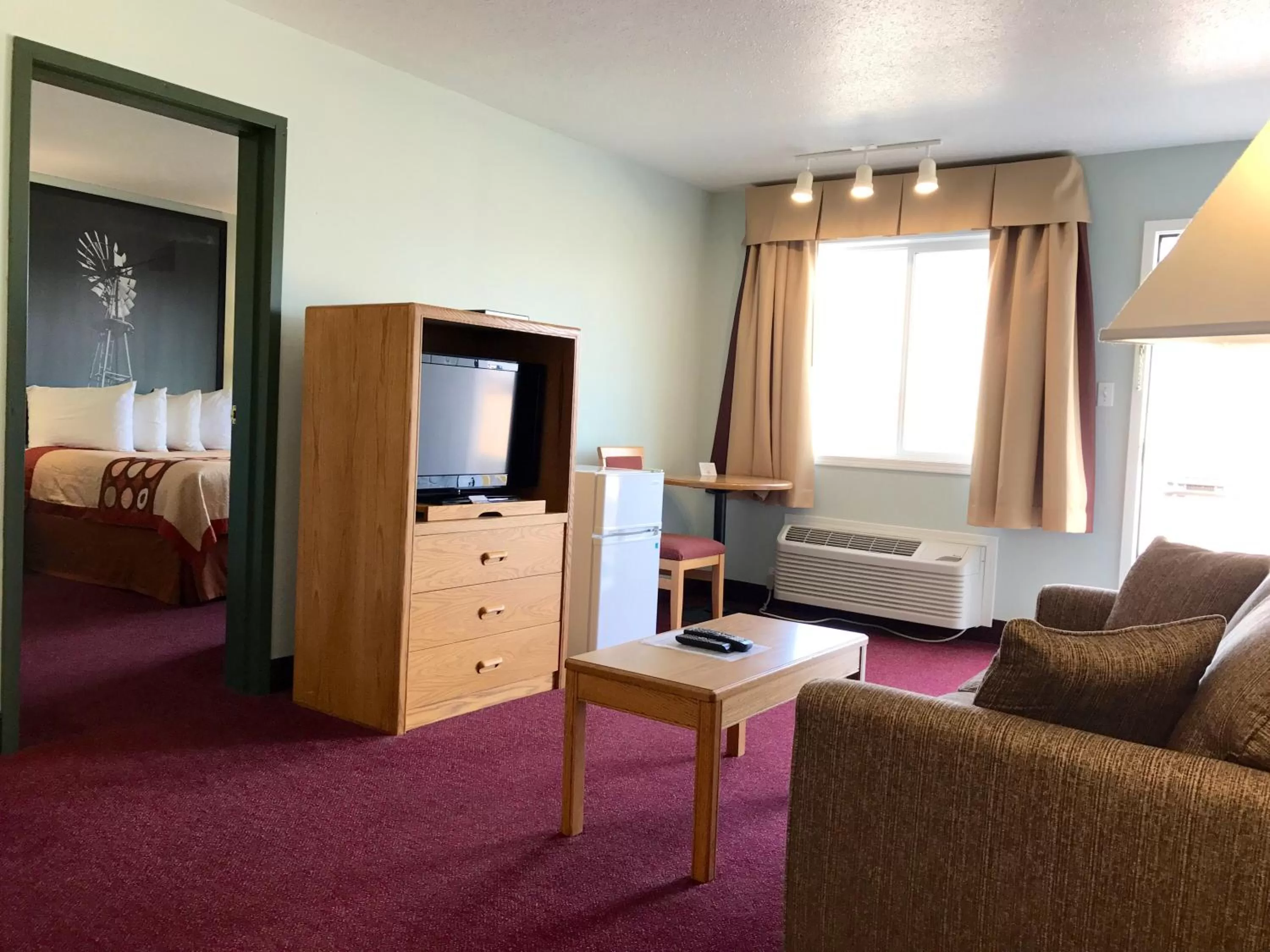 Living room, Bed in Super 8 by Wyndham Kindersley