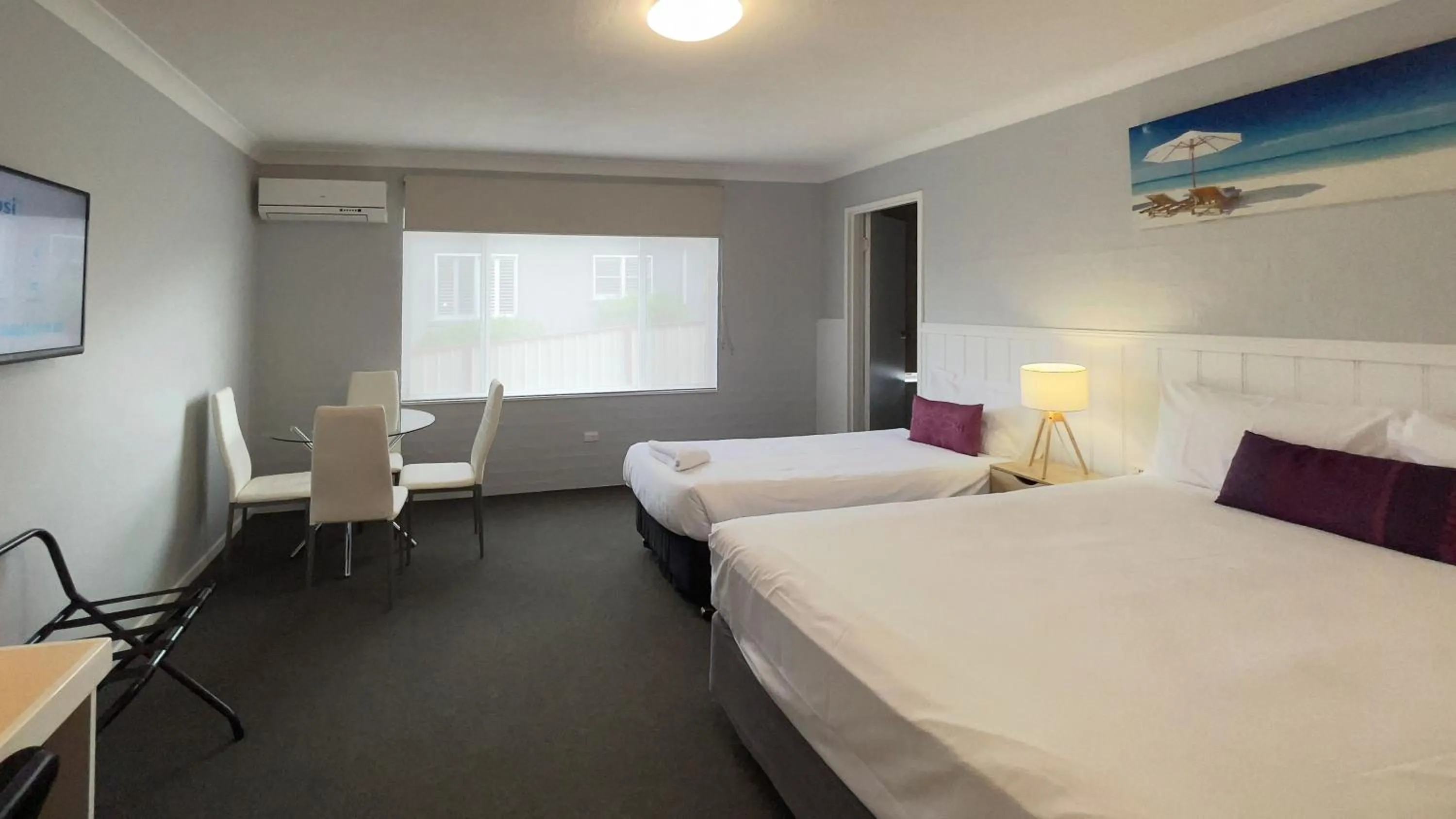 Bed in Marco Polo Motor Inn Taree