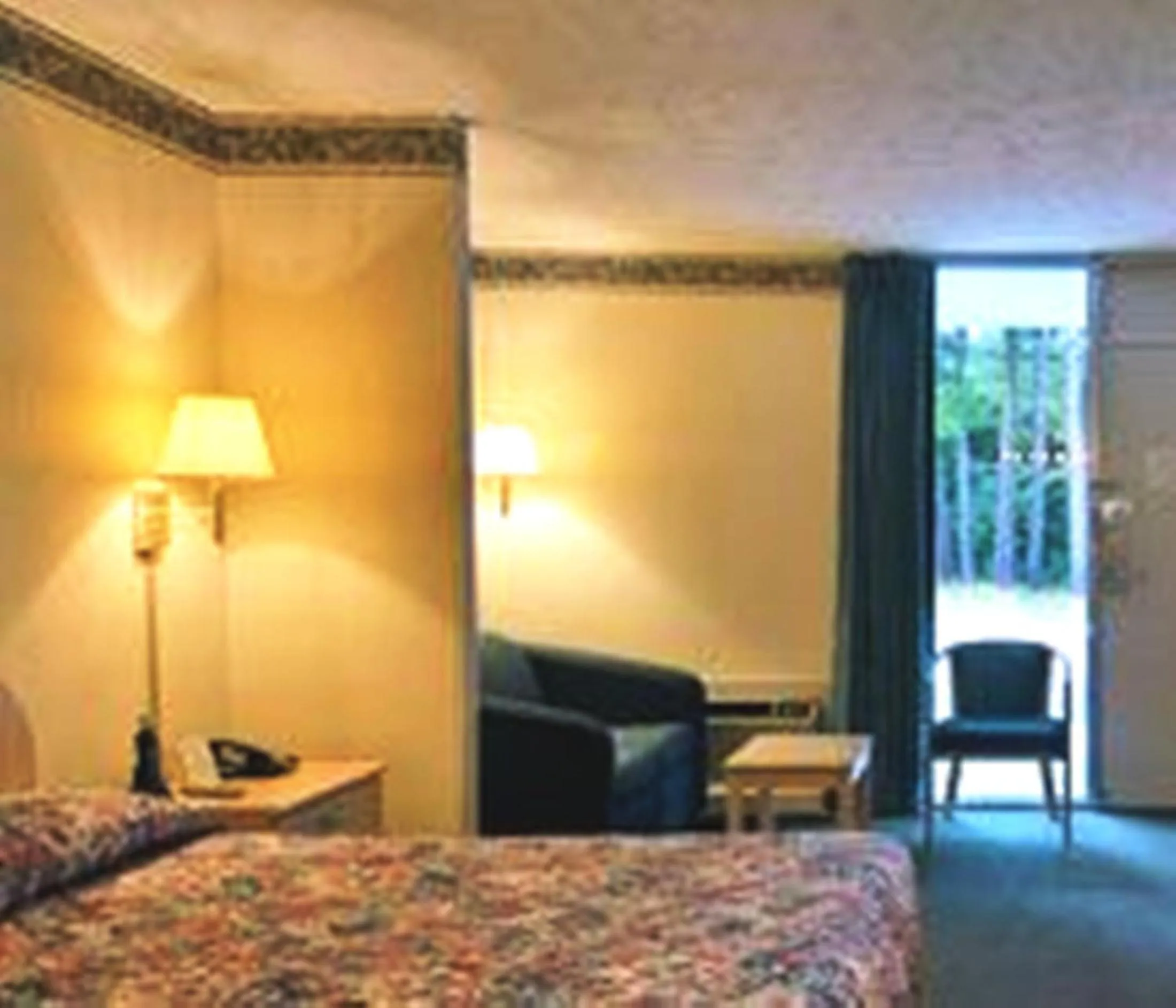 Bed in Howard Johnson by Wyndham Commerce GA