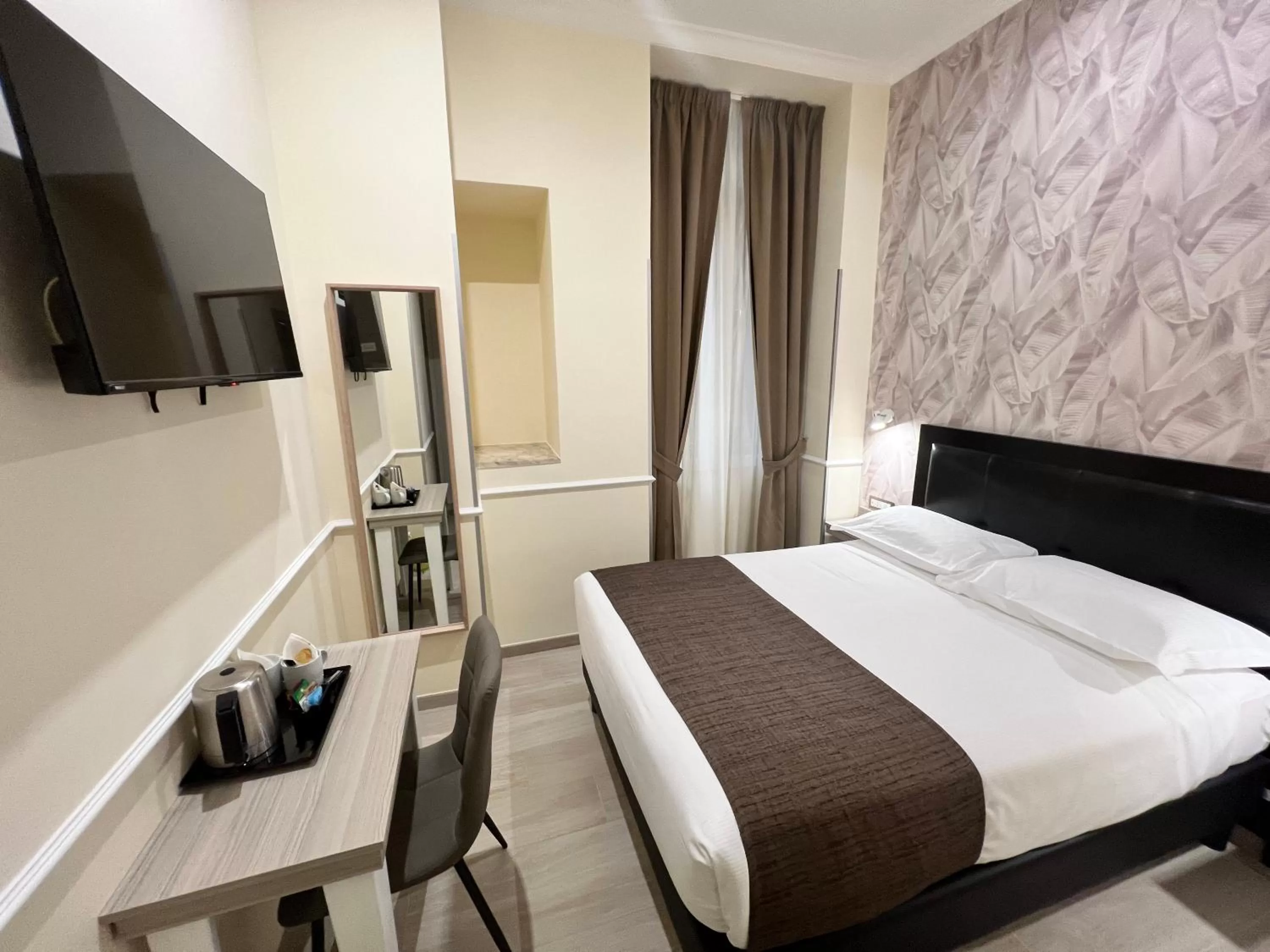 Bed in Hotel Le Petit