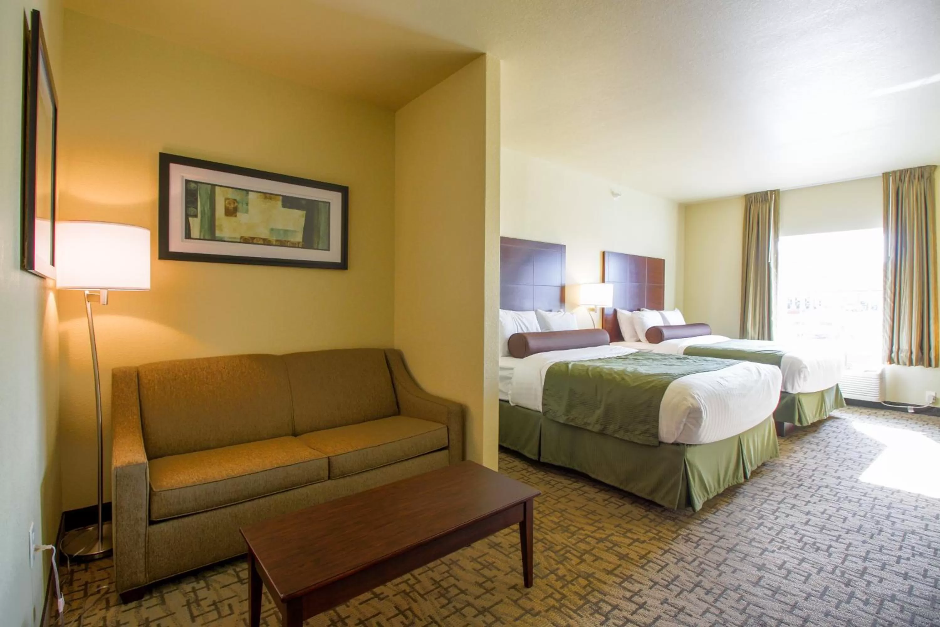 Bedroom, Bed in Cobblestone Hotel & Suites - Devils Lake