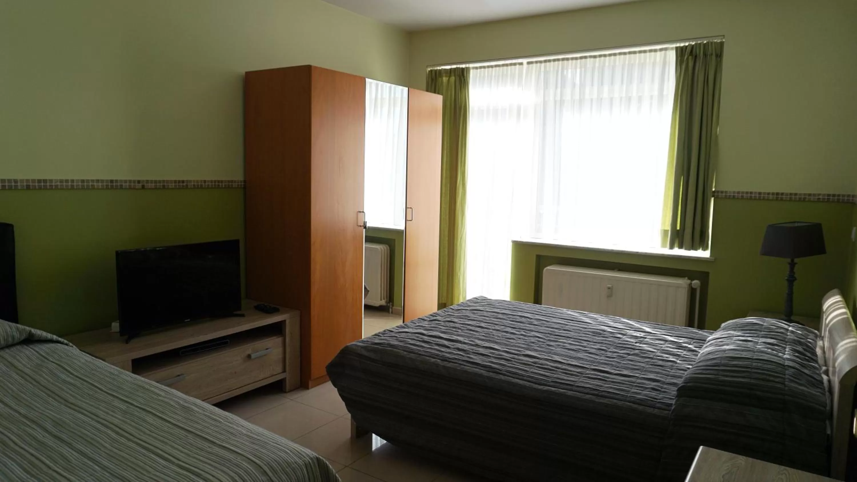 Bed in Aparthotel Résidence Bara Midi