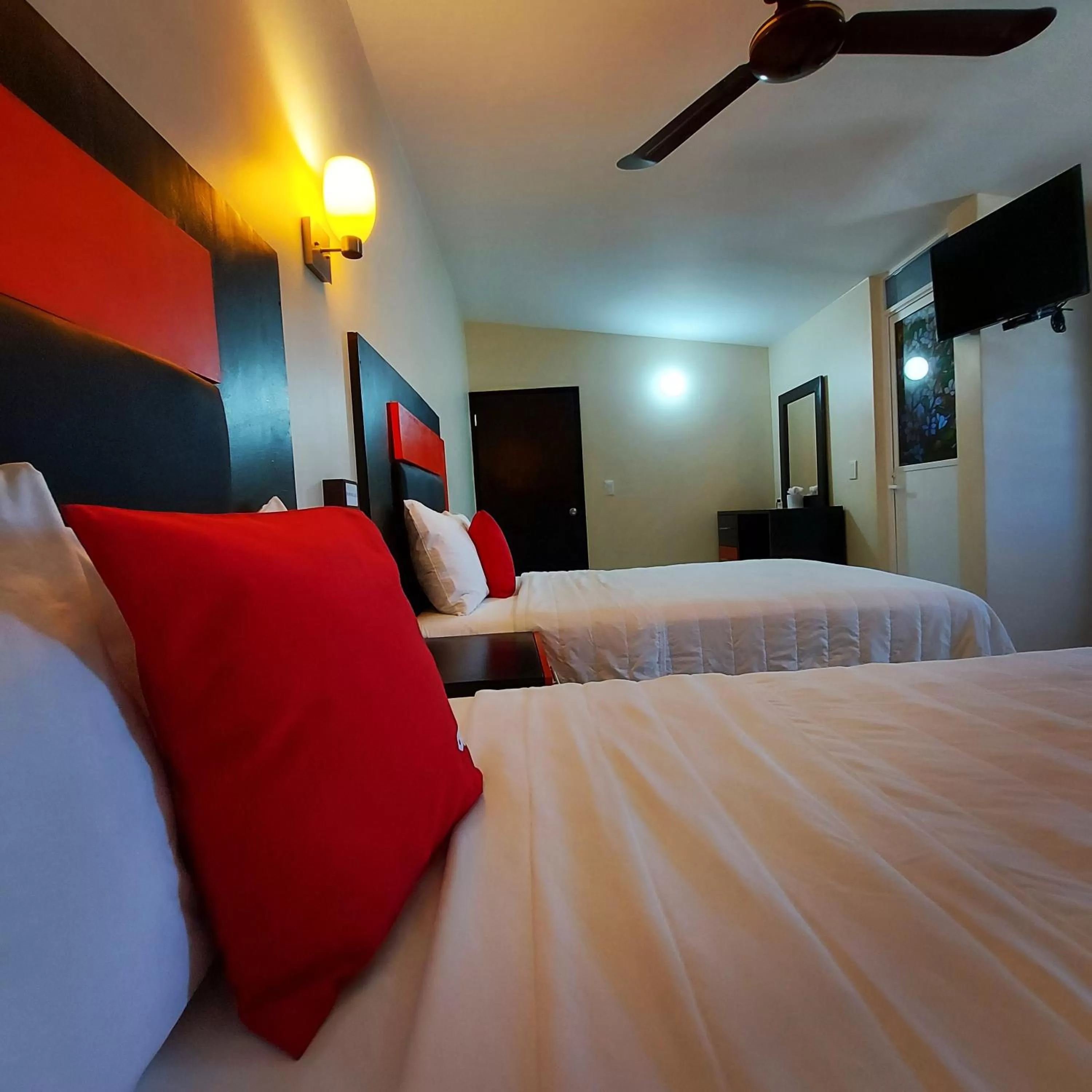 Photo of the whole room, Bed in Hotel Jardín Cancún