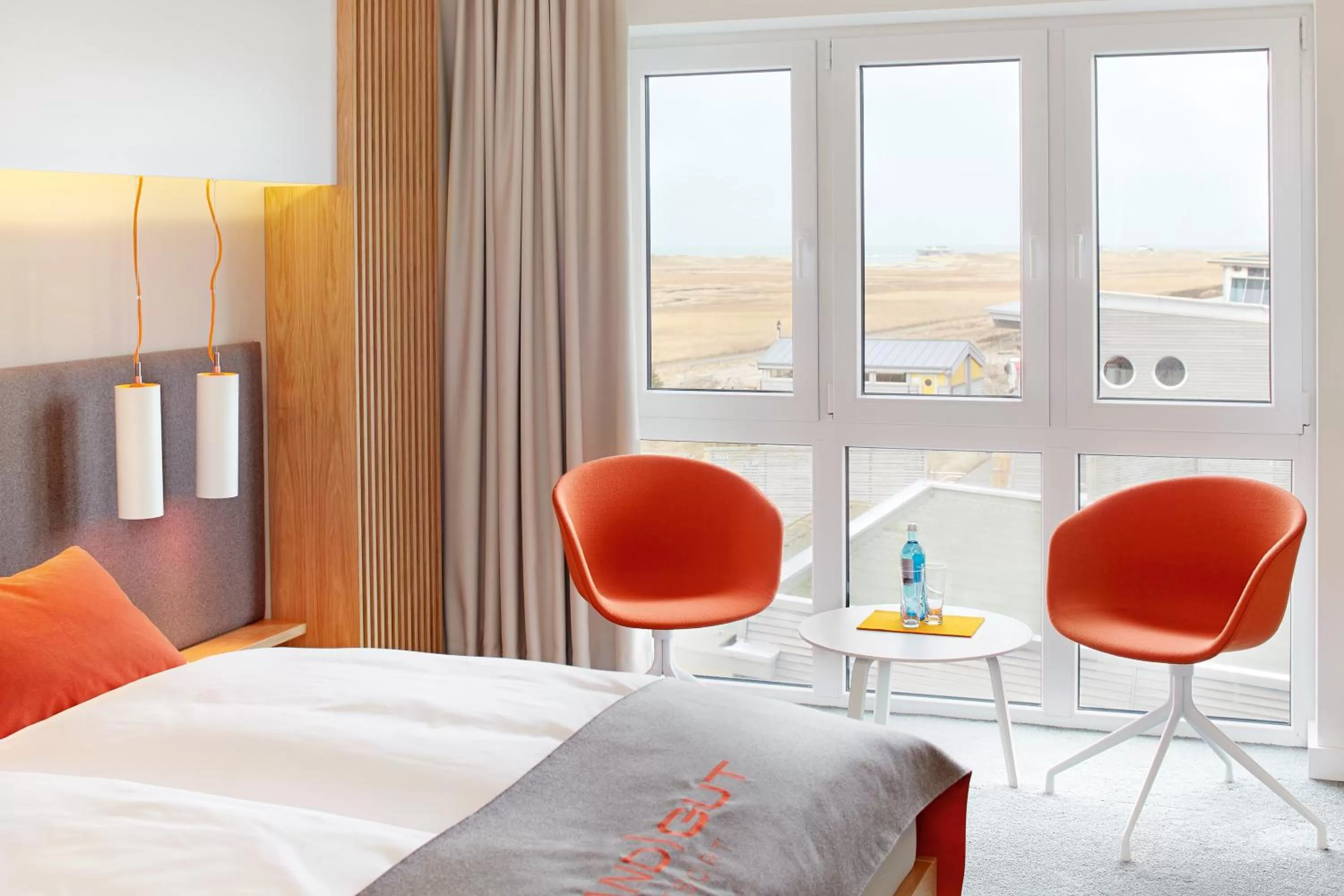 Seating area, Bed in Strandgut Resort