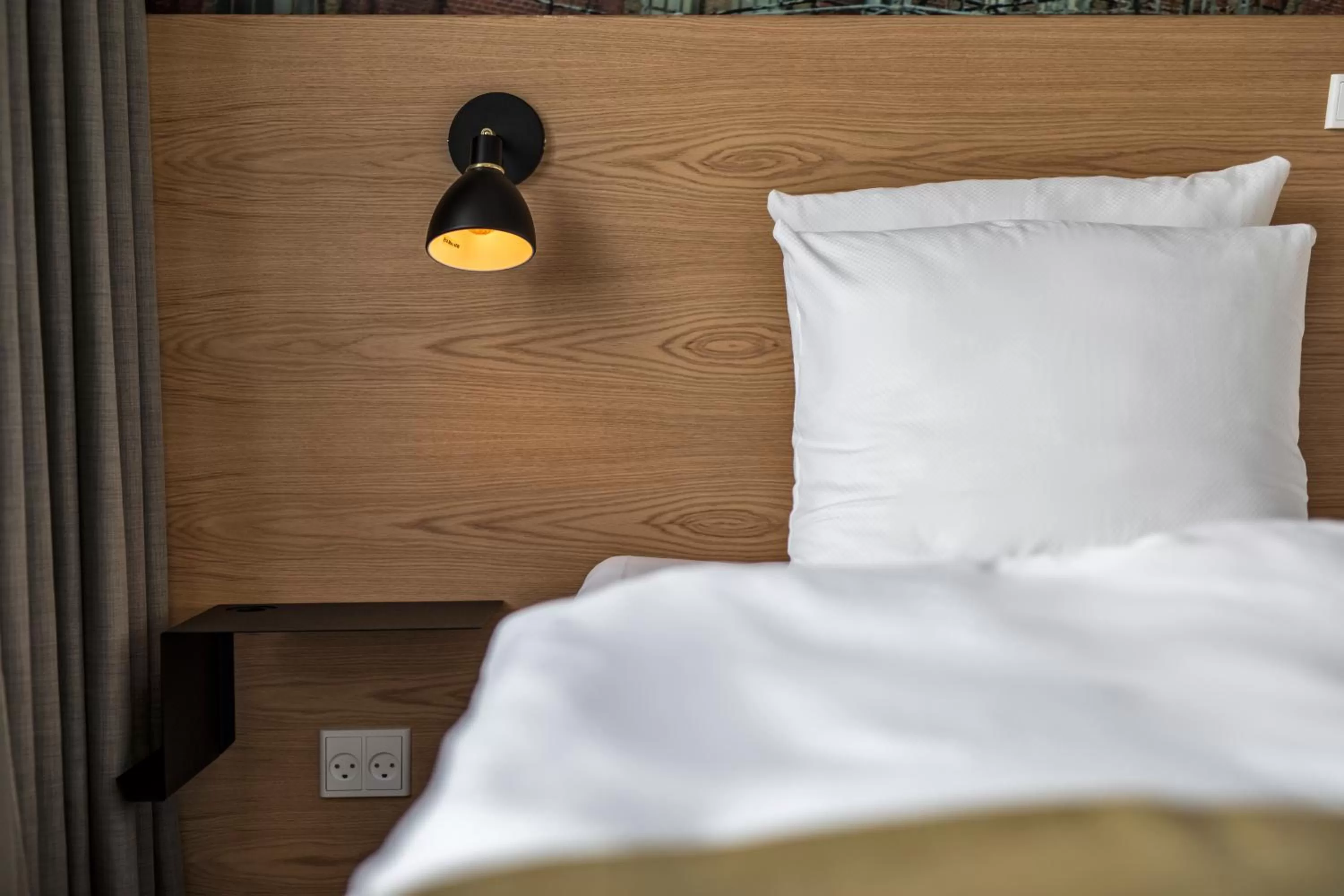 Bed in KOMPAS Hotel Aalborg