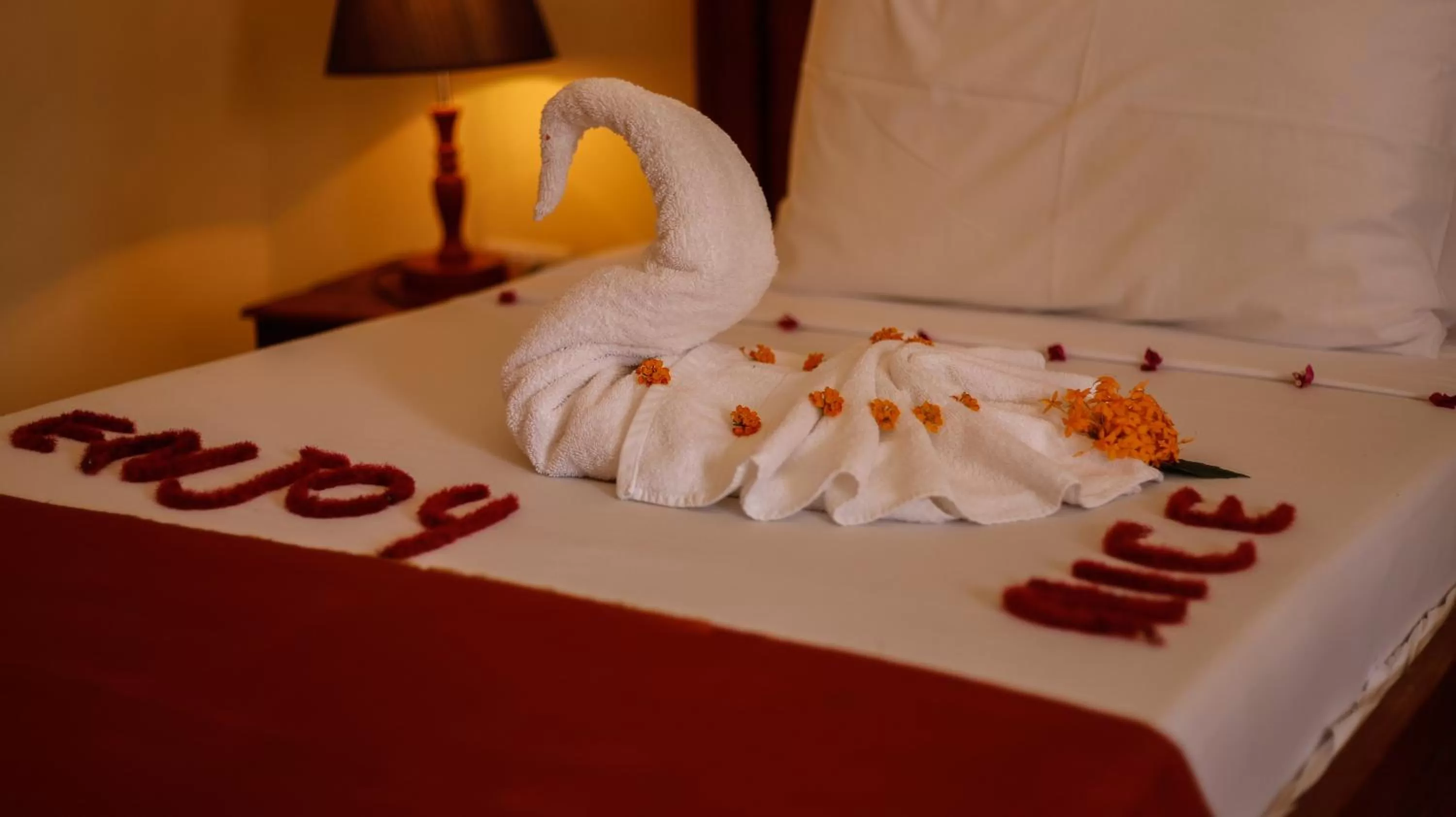 Bed in Amaan Beach Bungalows