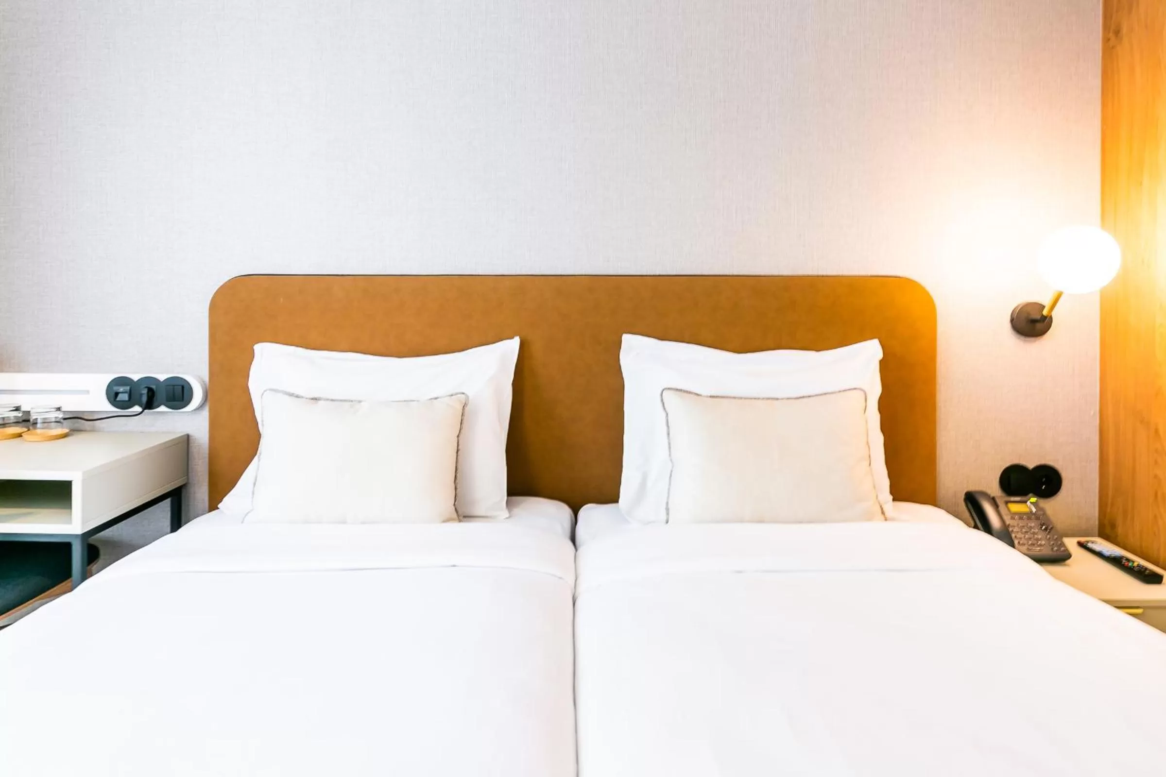 Bed in LX SoHo Boutique Hotel by RIDAN Hotels