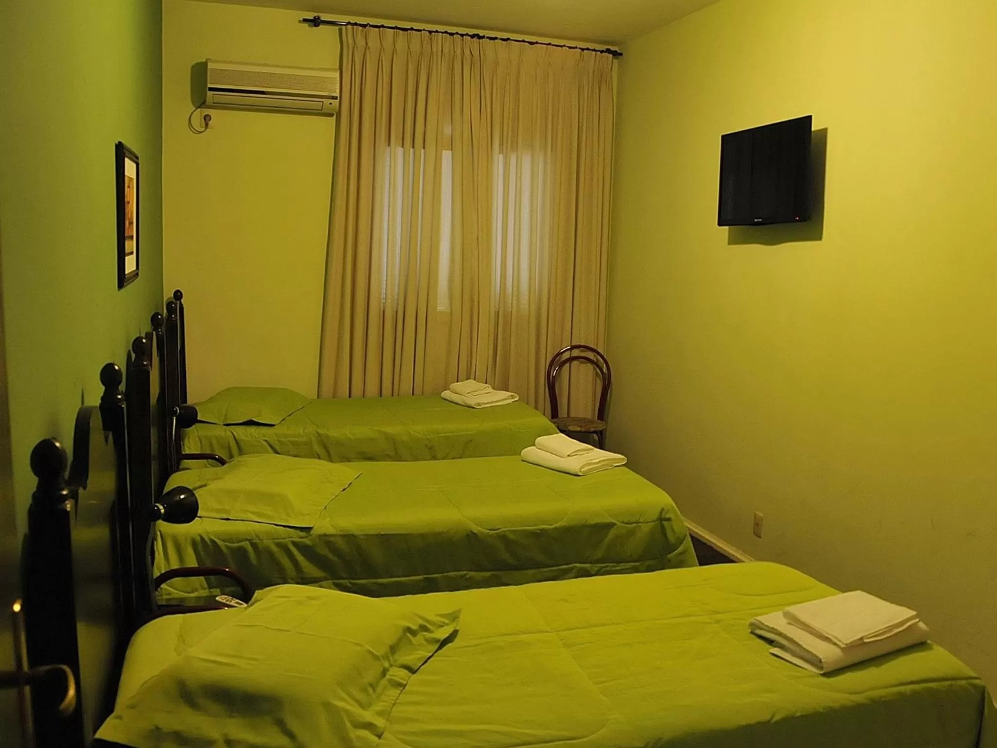 Photo of the whole room, Bed in Hotel Uruguay Brasil