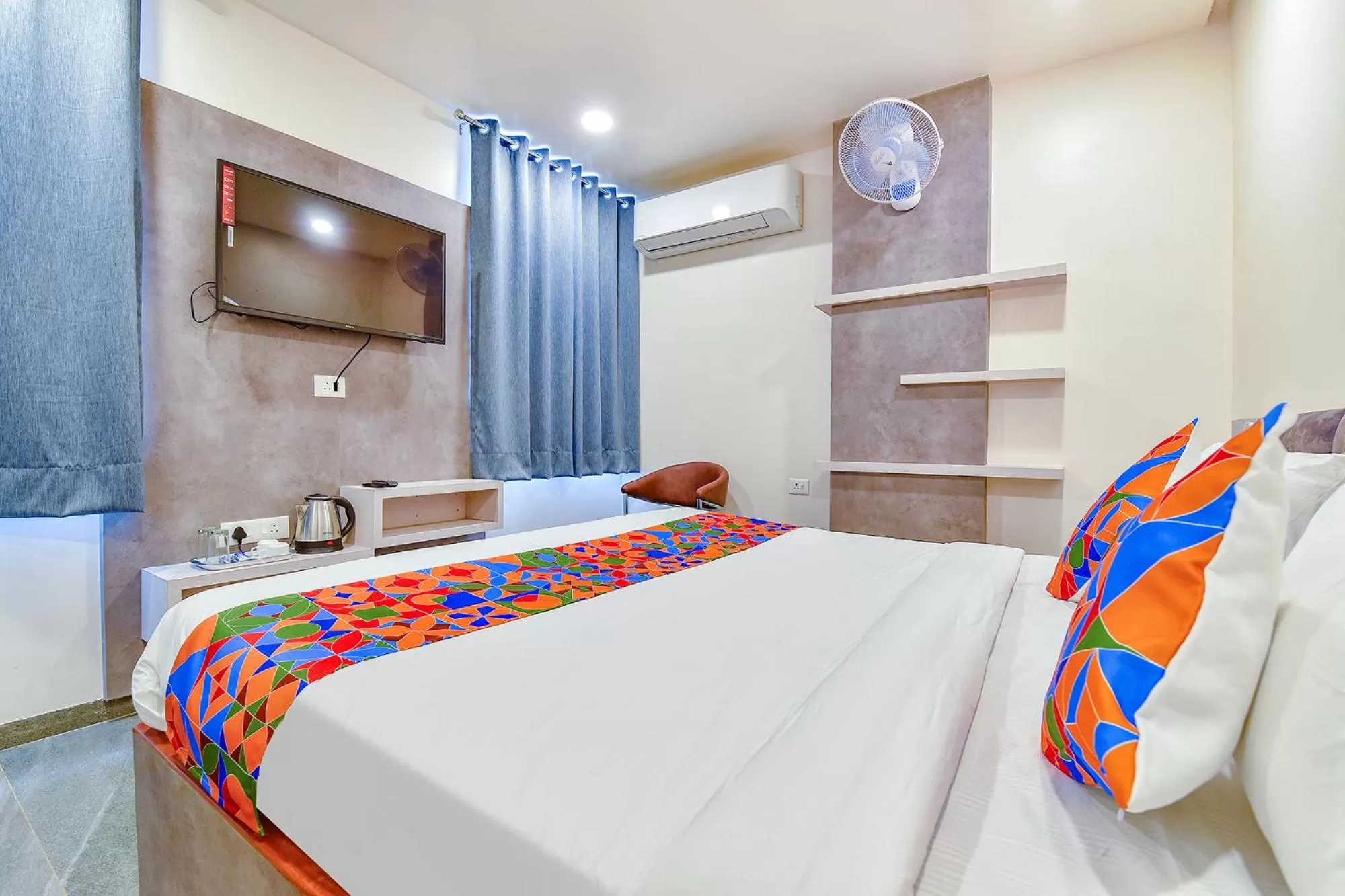 Bed in FabHotel Prime Rudra