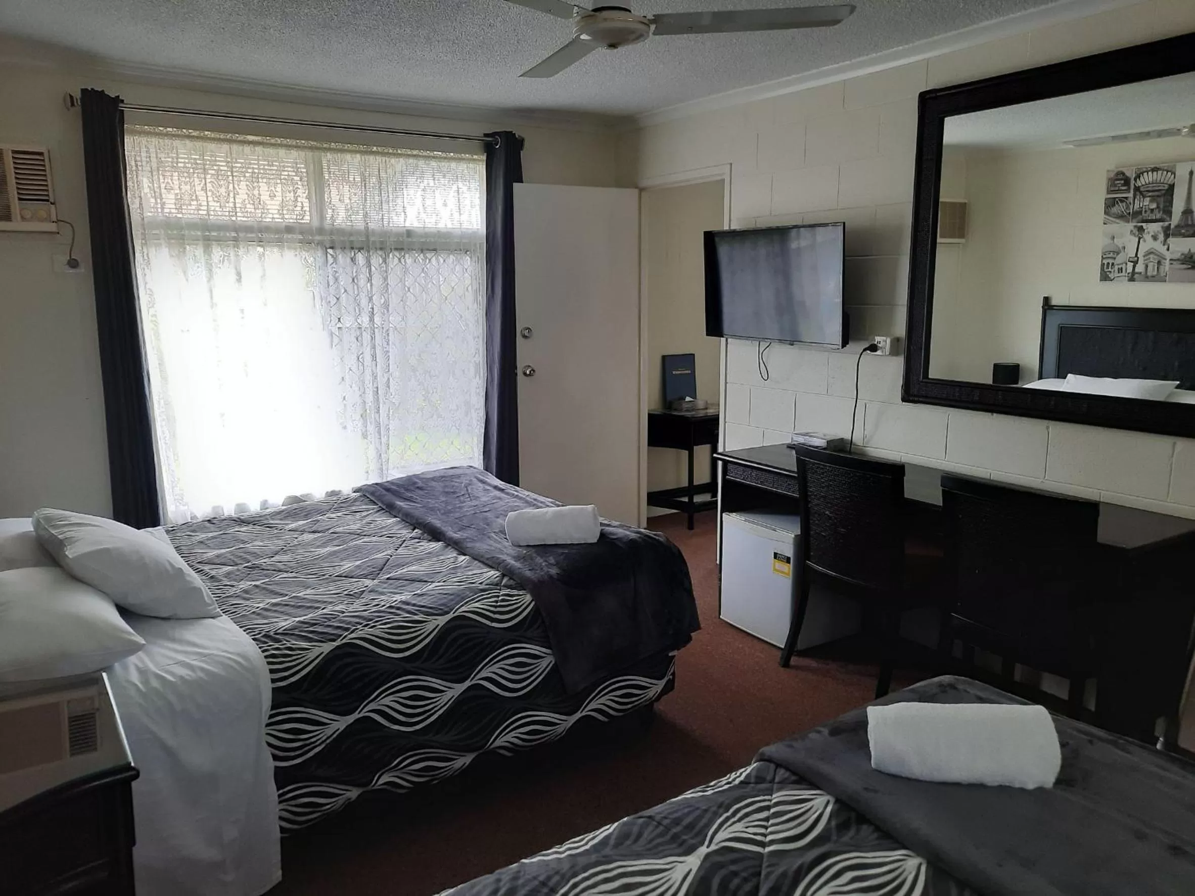 Bed in Flying Spur Motel