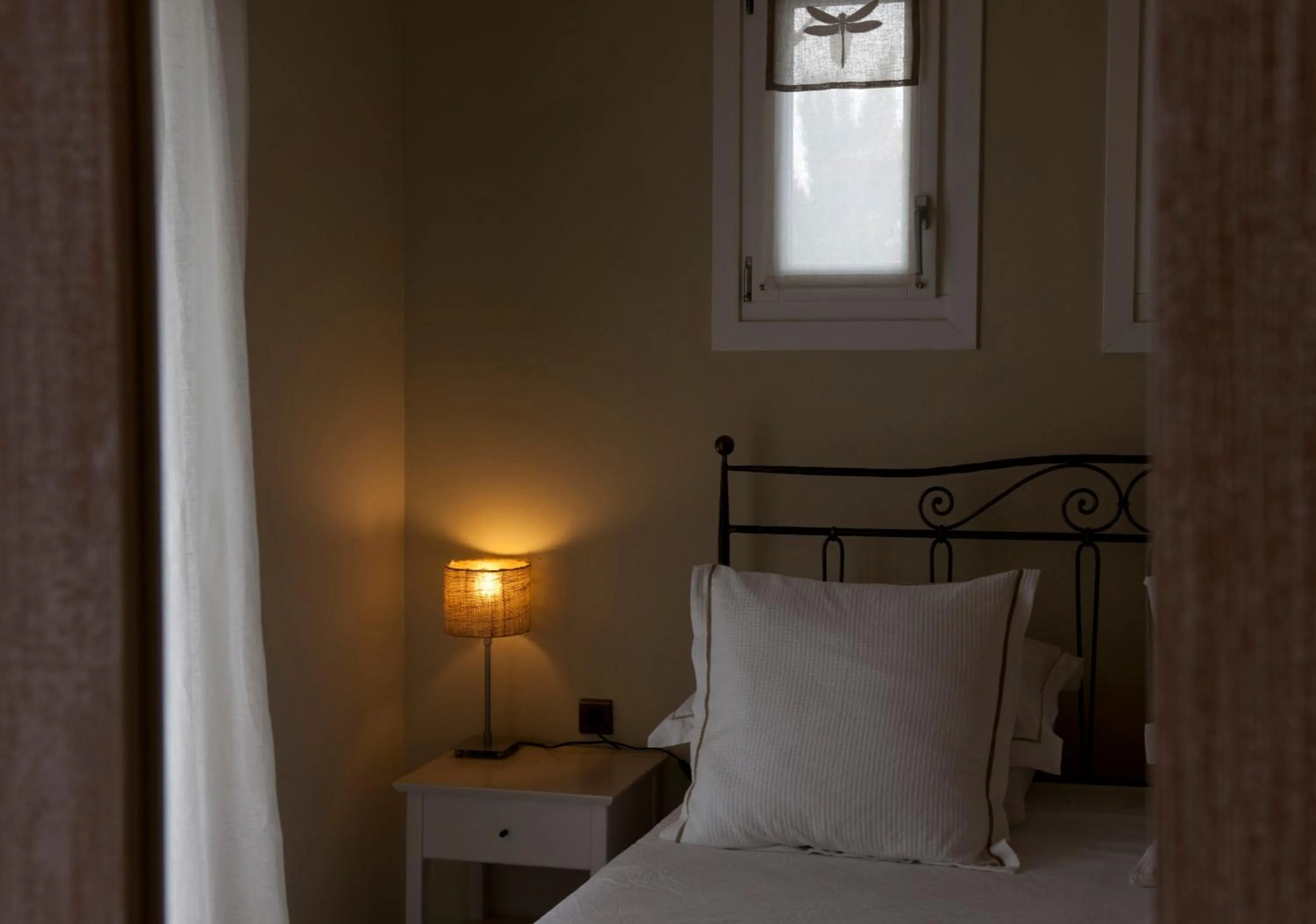 Decorative detail, Bed in Ammos Naxos Exclusive Apartments & Studios