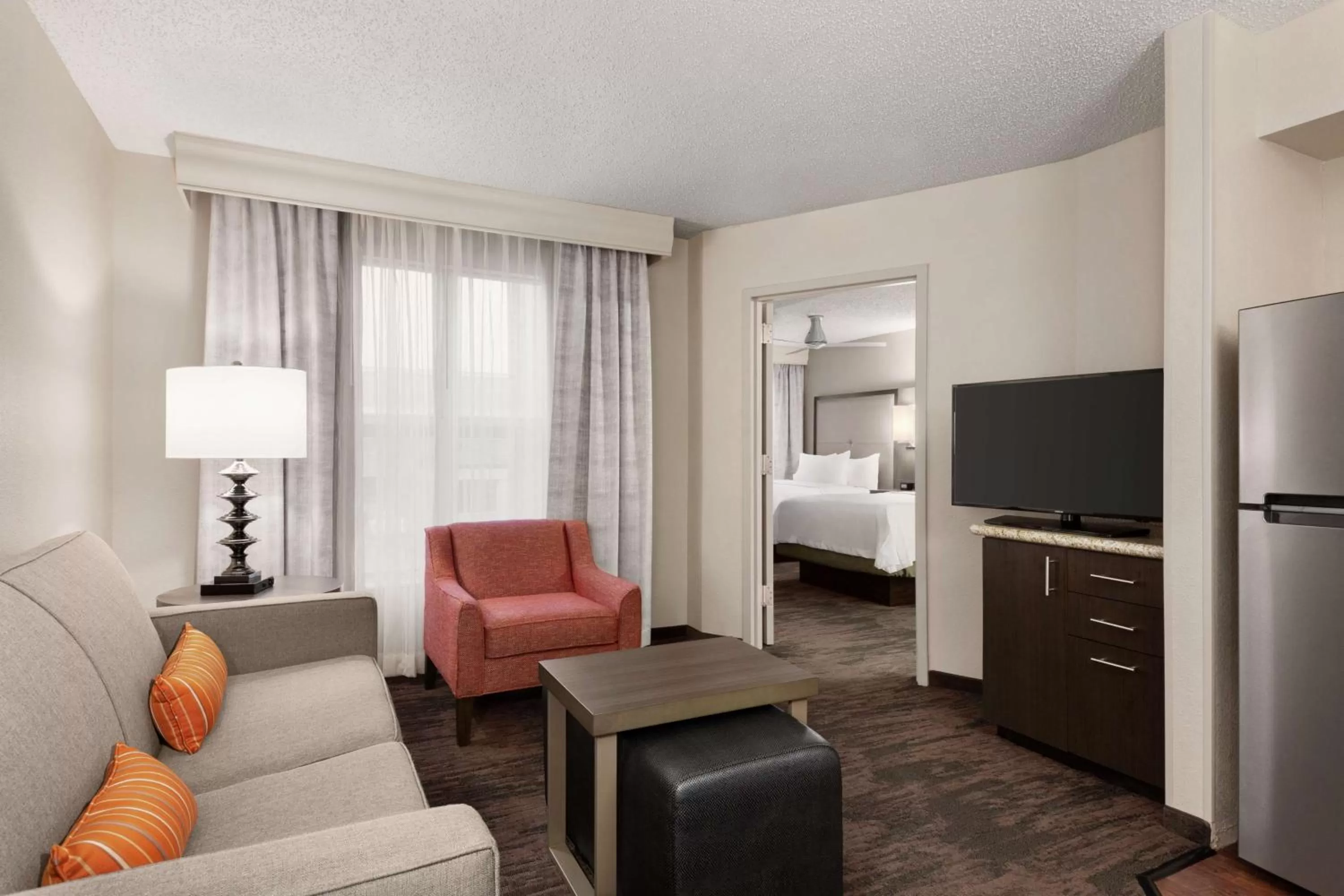 Living room, Bed in Homewood Suites by Hilton Dallas-Plano
