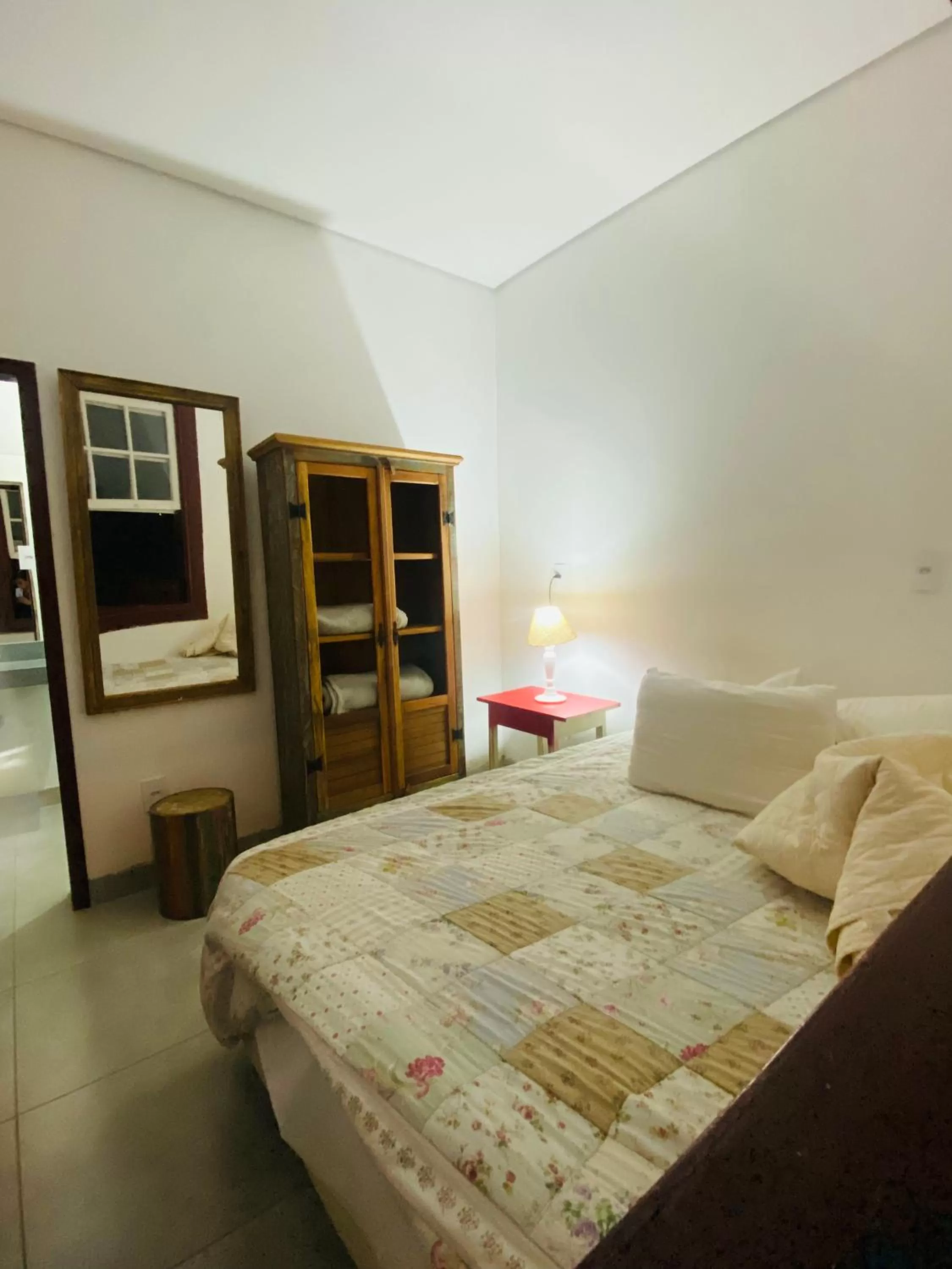 Bed in POUSADA CHARLOTTE