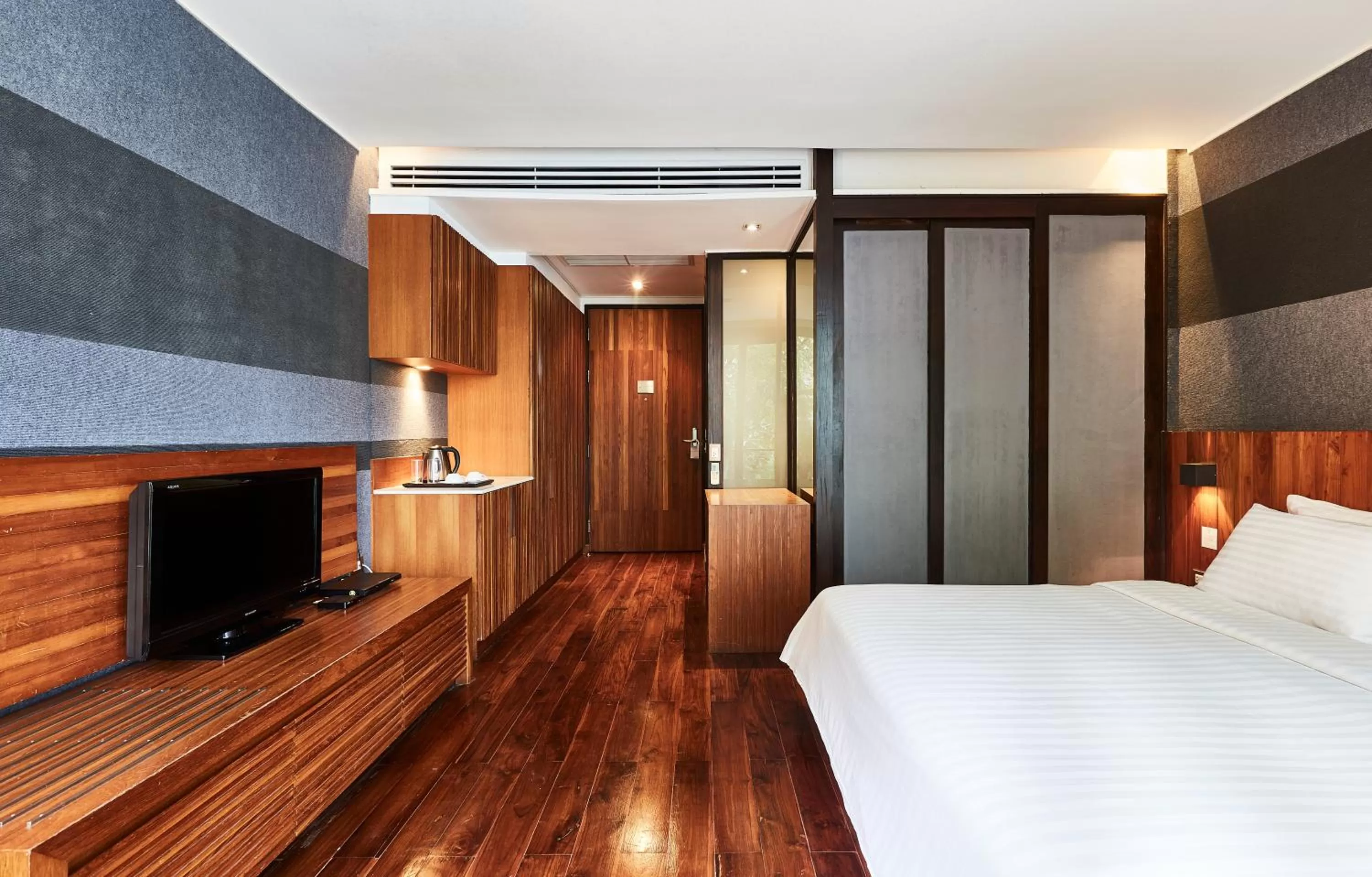 Bed in LUXX Langsuan Hotel - SHA Plus