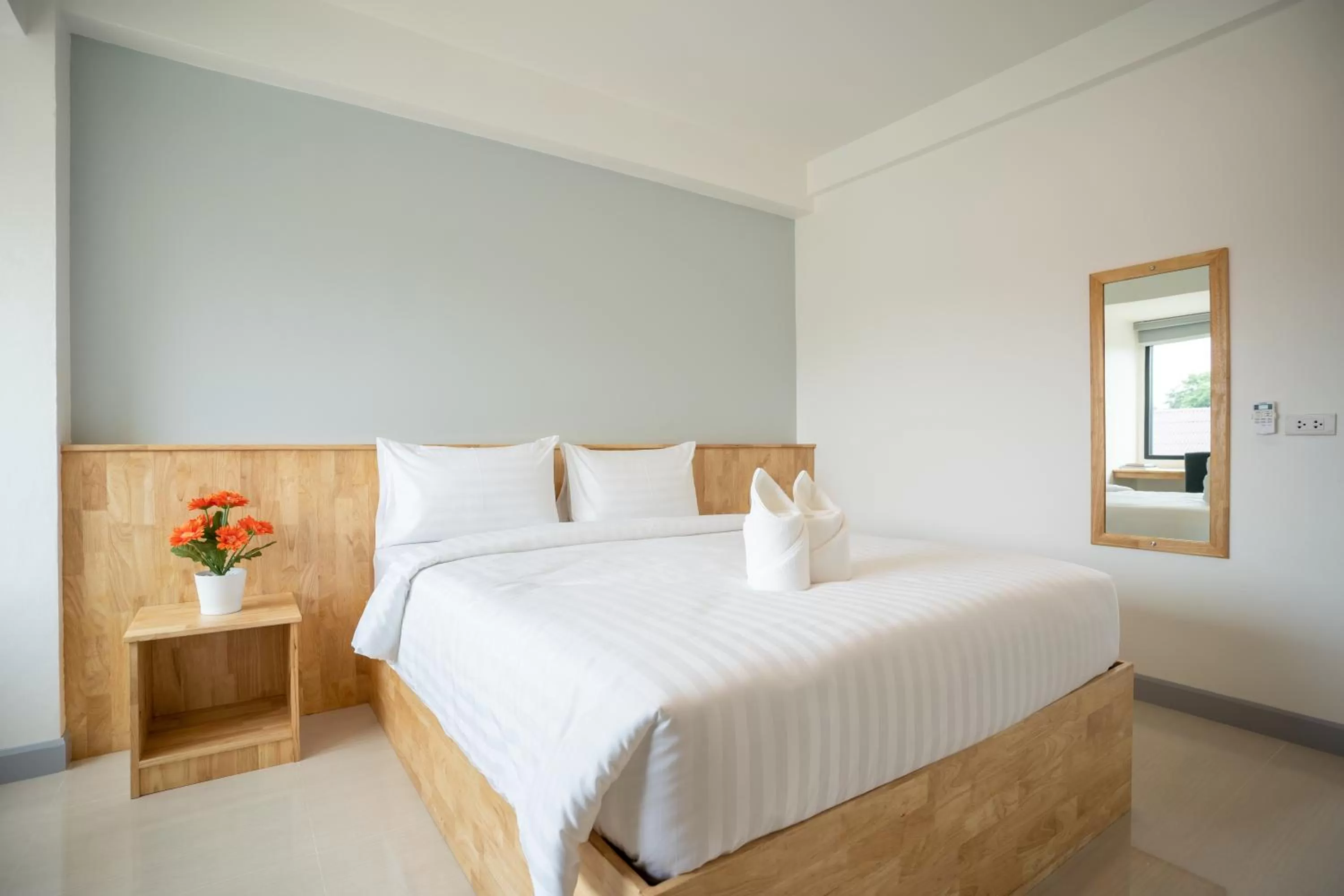 Bed in Meesuk ChiangRai Hotel, SHA Certified