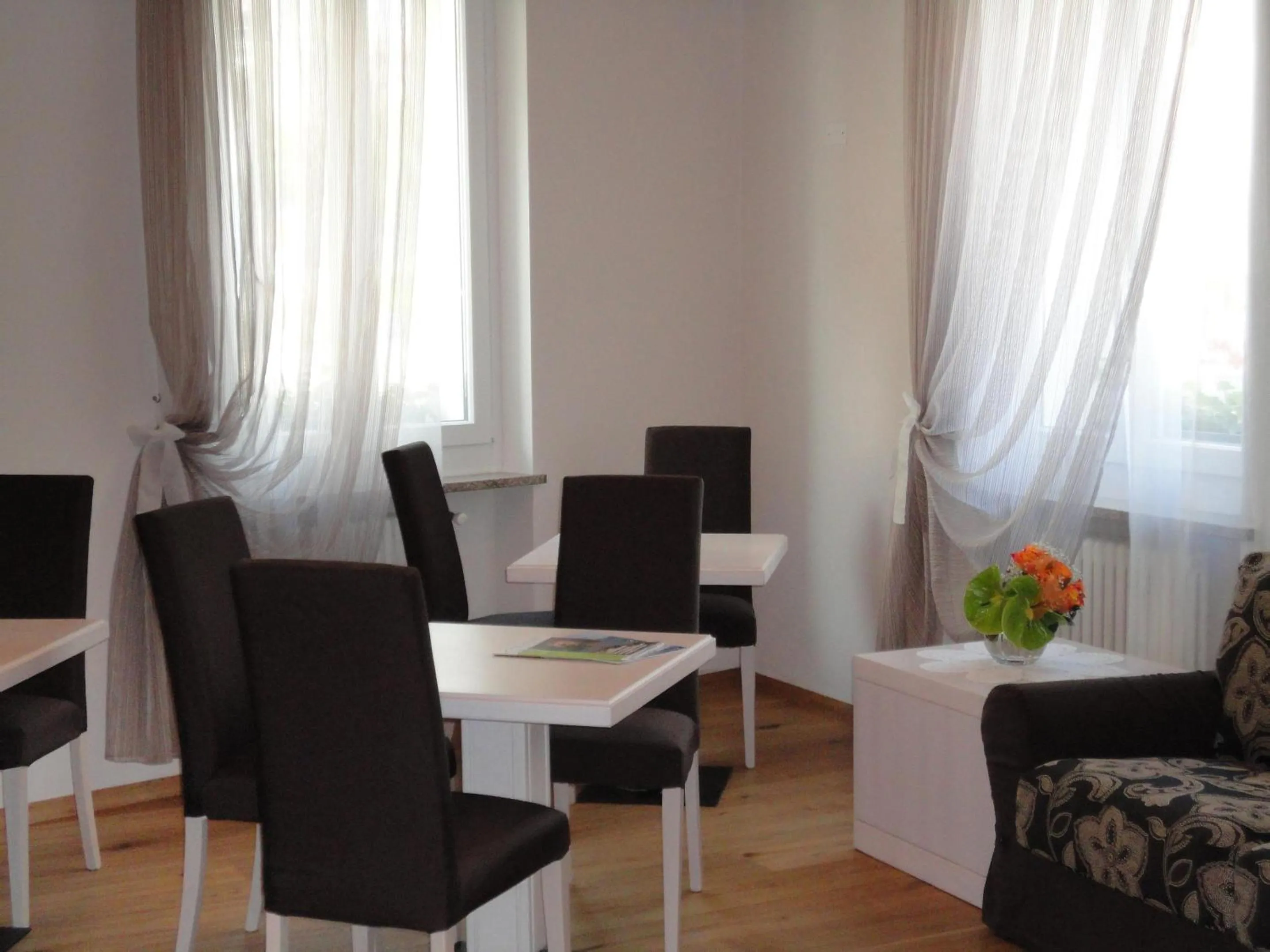 Communal lounge/ TV room in Albergo Tuenno