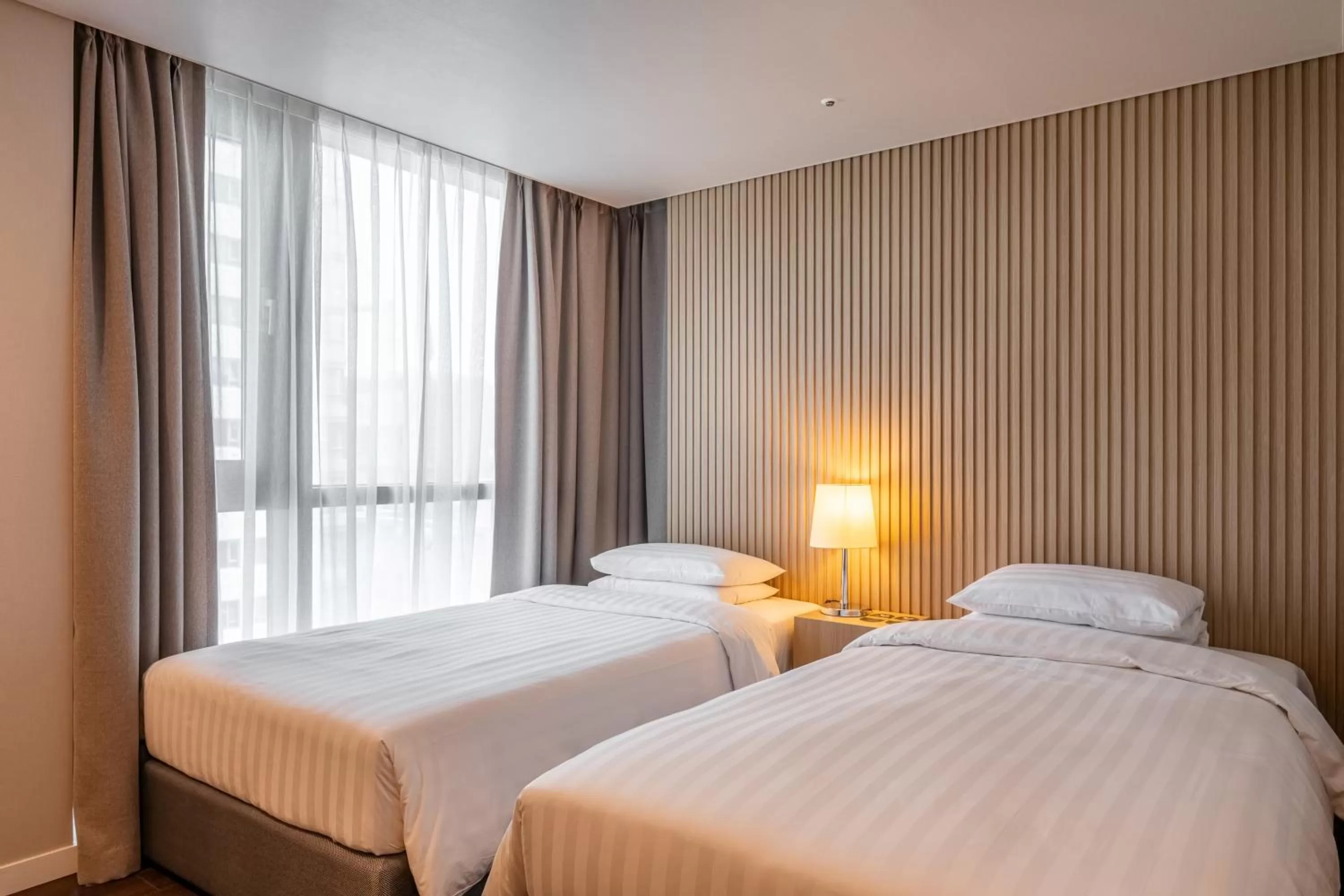 Bed in Haeundae Centum Hotel