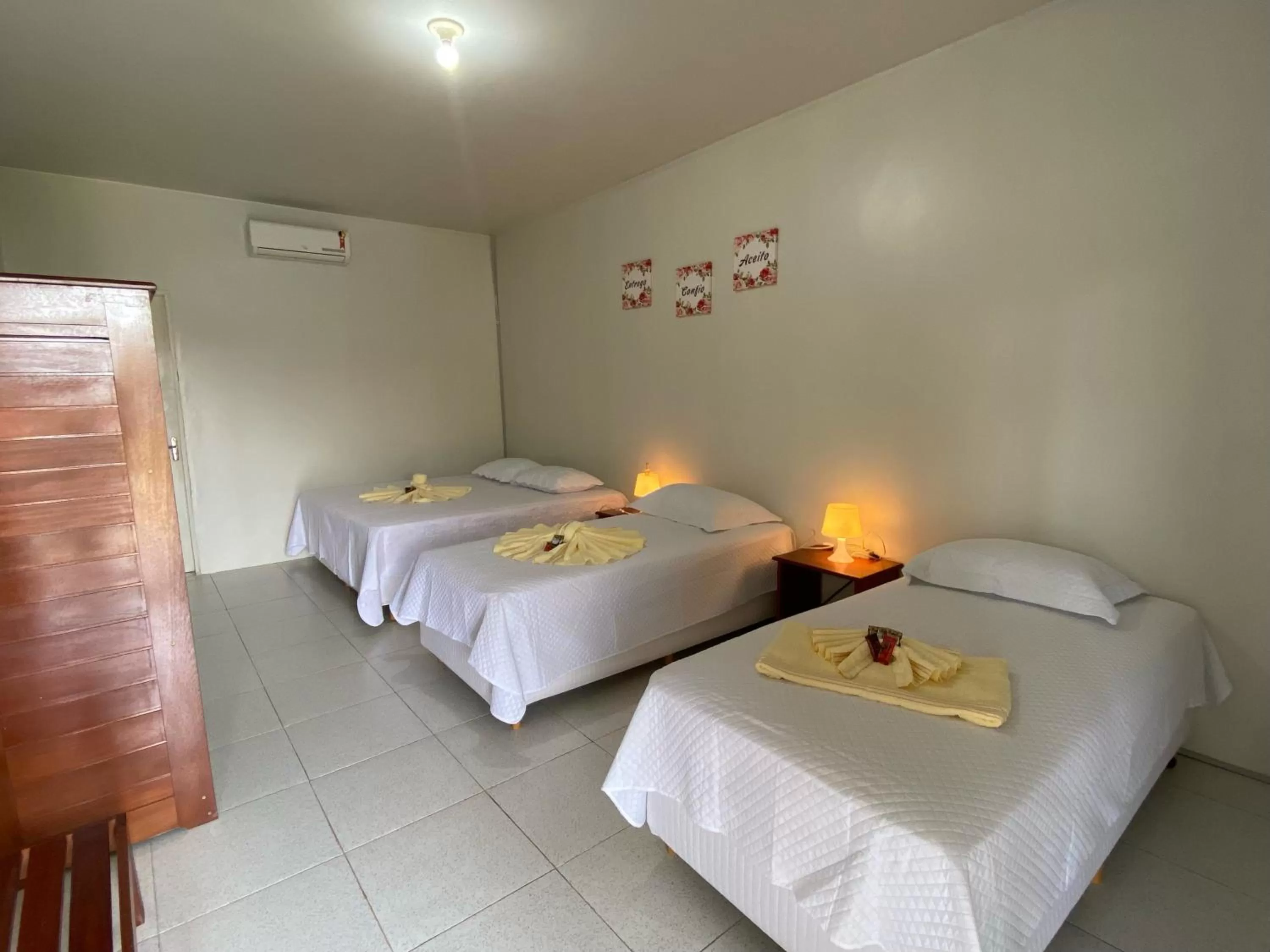 Bed in POUSADA ESTRELA DA MANHÃ