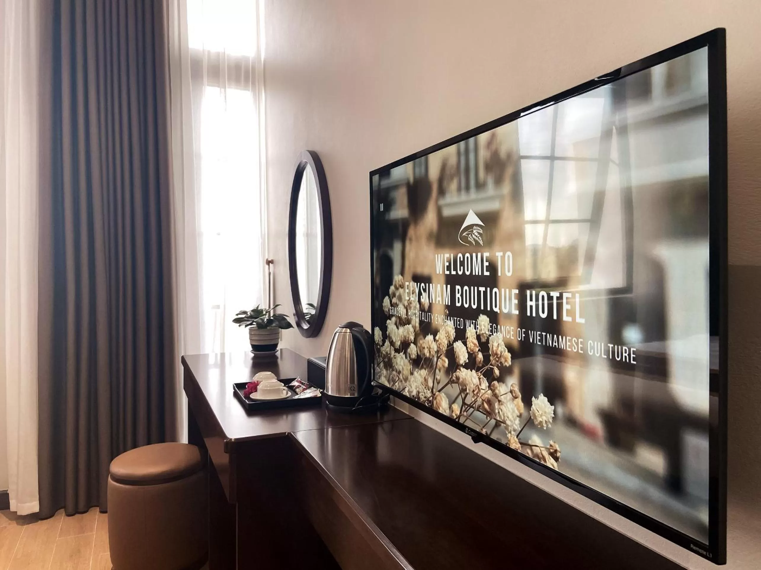TV and multimedia in Elysinam Boutique Hotel Ha Long