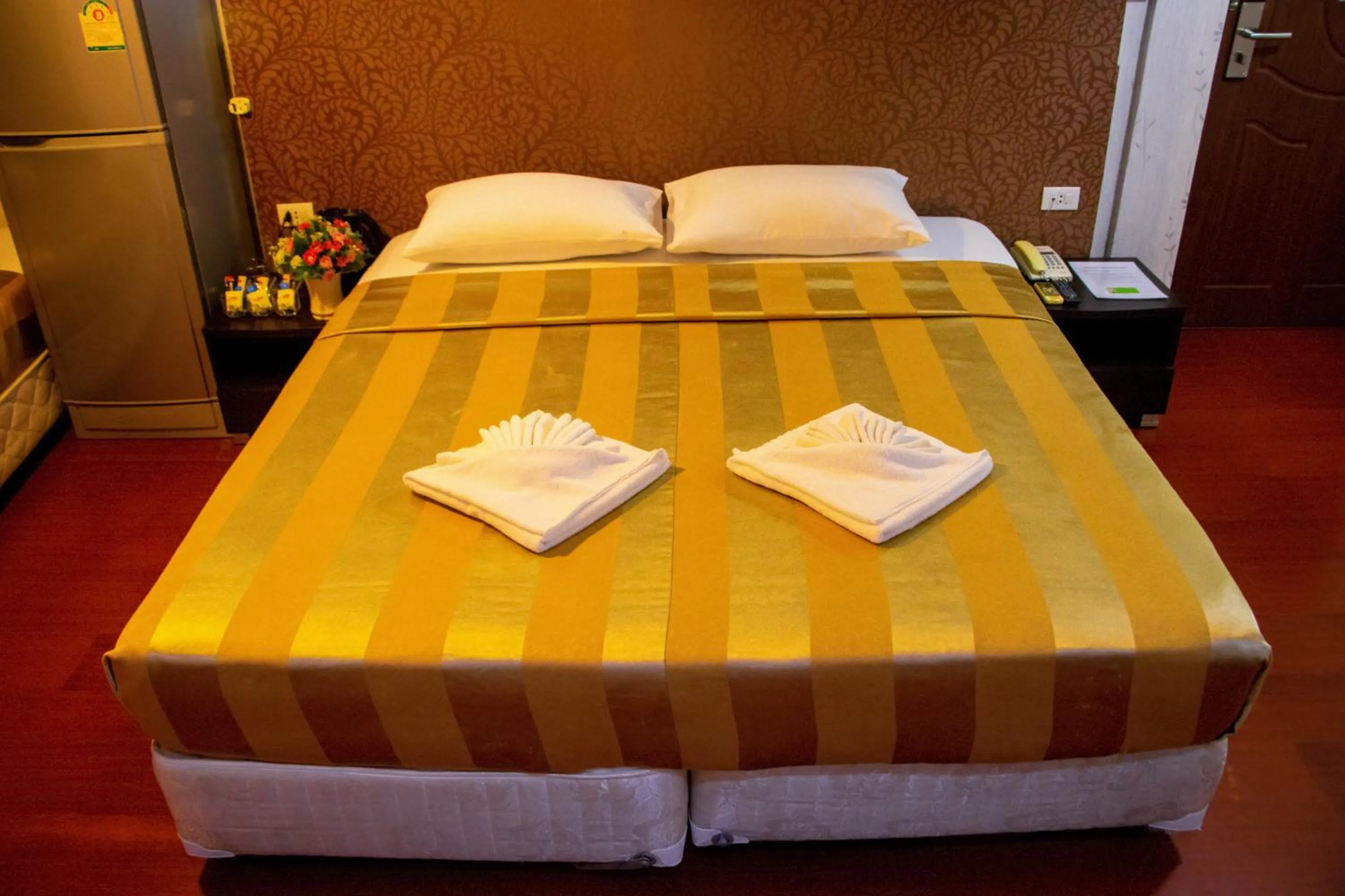 Bed in Visiting Card Hotel & Resort