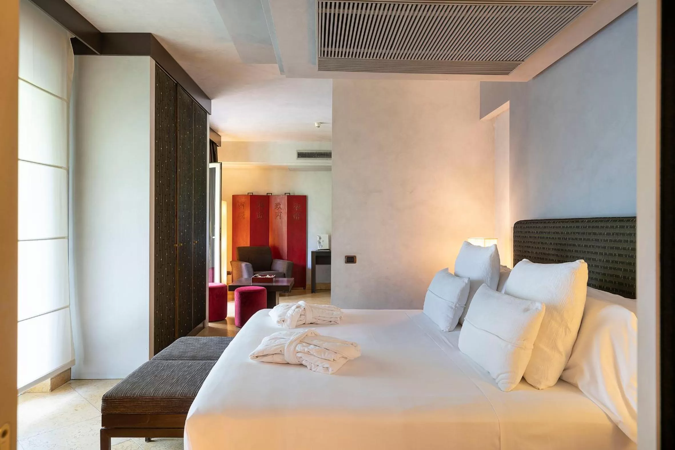 Bed in Romano Palace Luxury Hotel