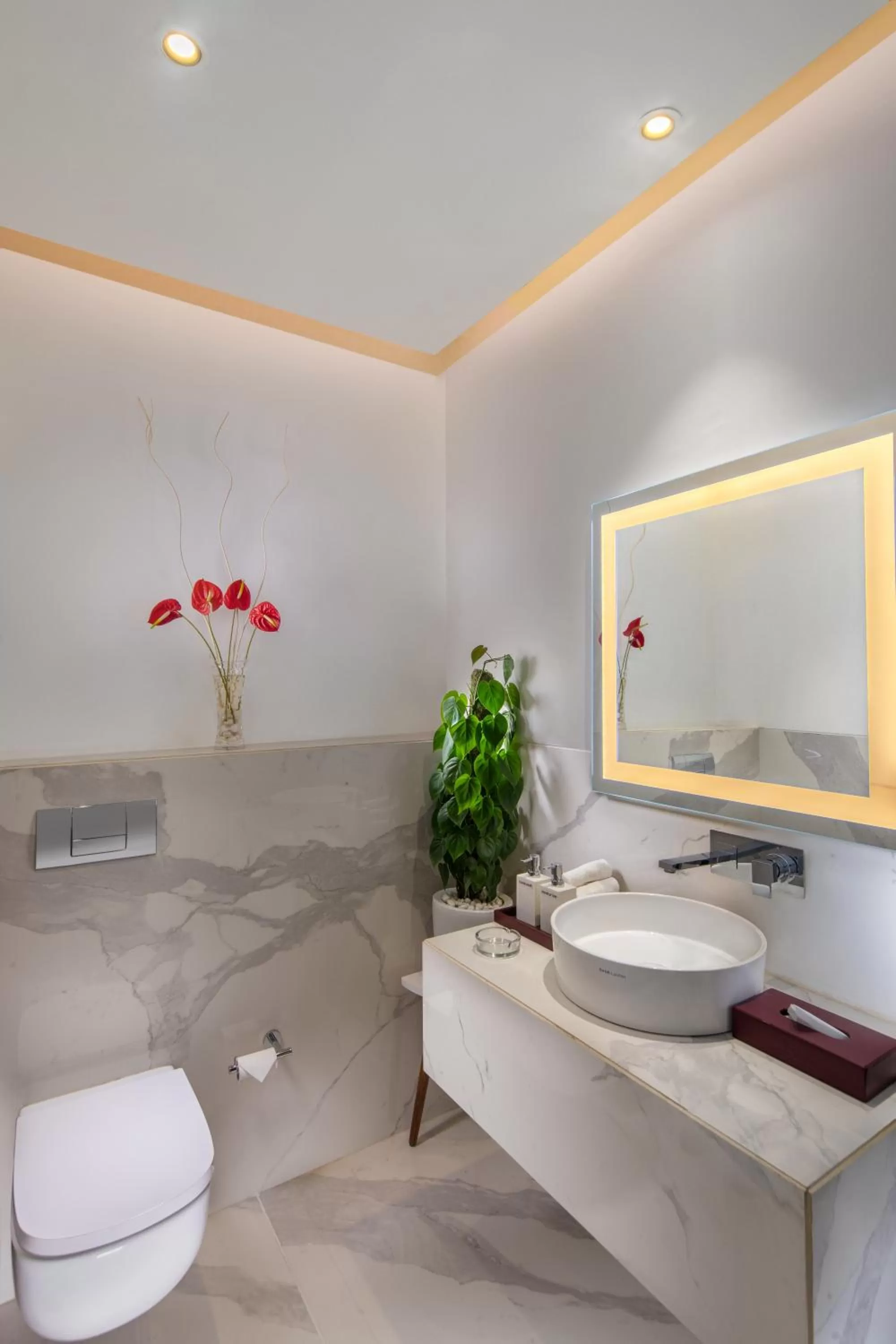 Toilet in Sandal Suites by Lemon Tree Hotels
