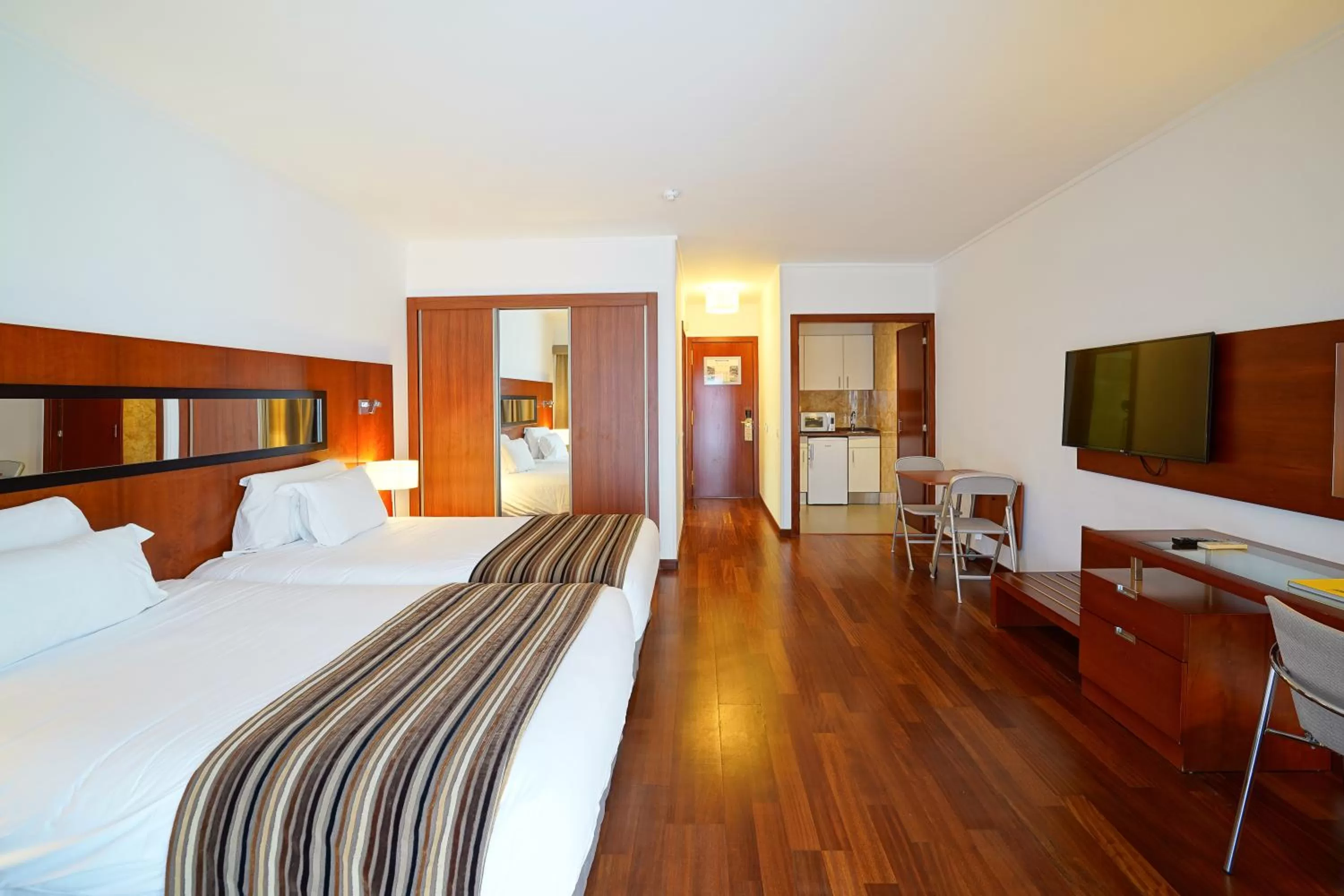 Bed in Legendary Lisboa Suites