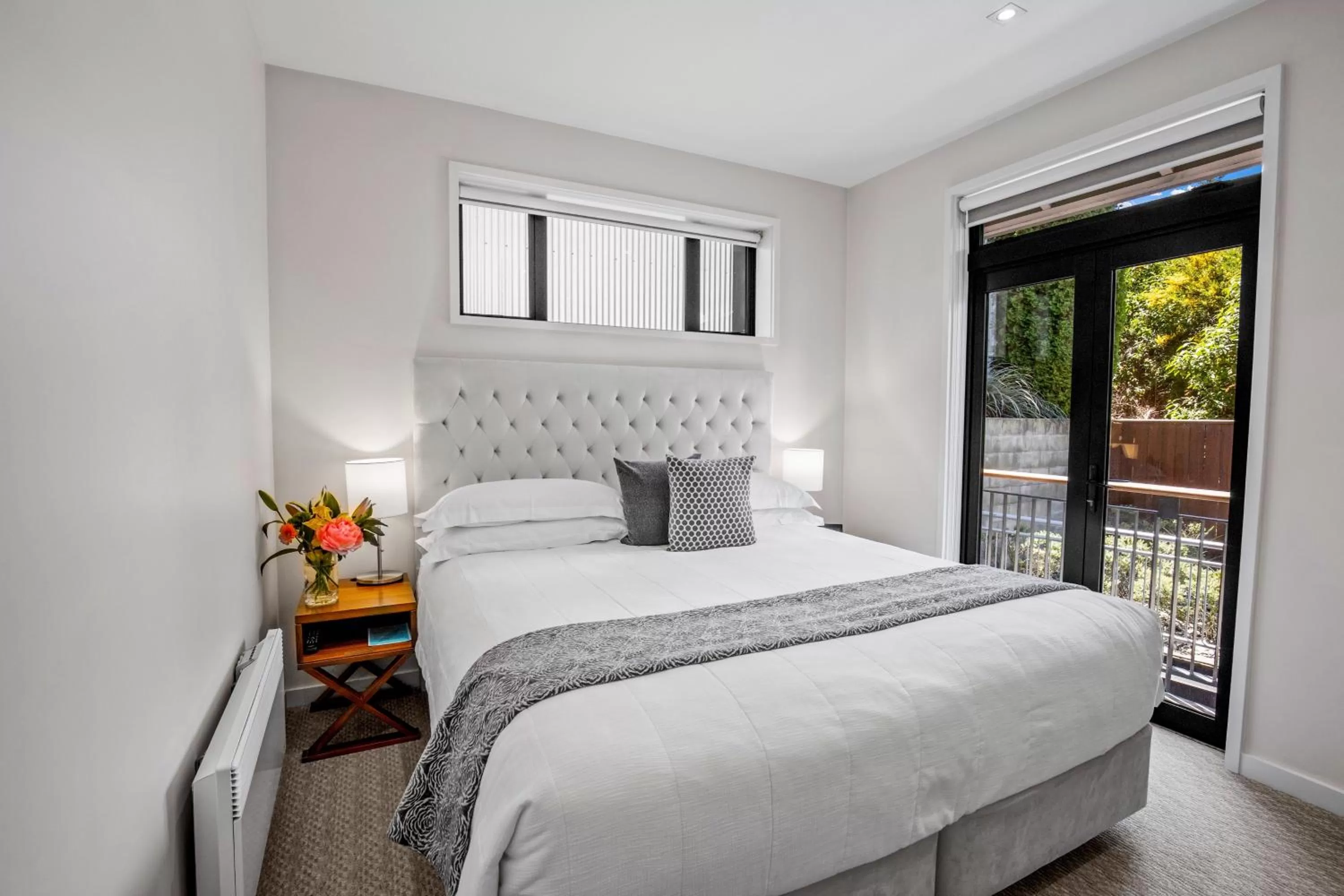 Bed in The Rees Hotel & Luxury Apartments