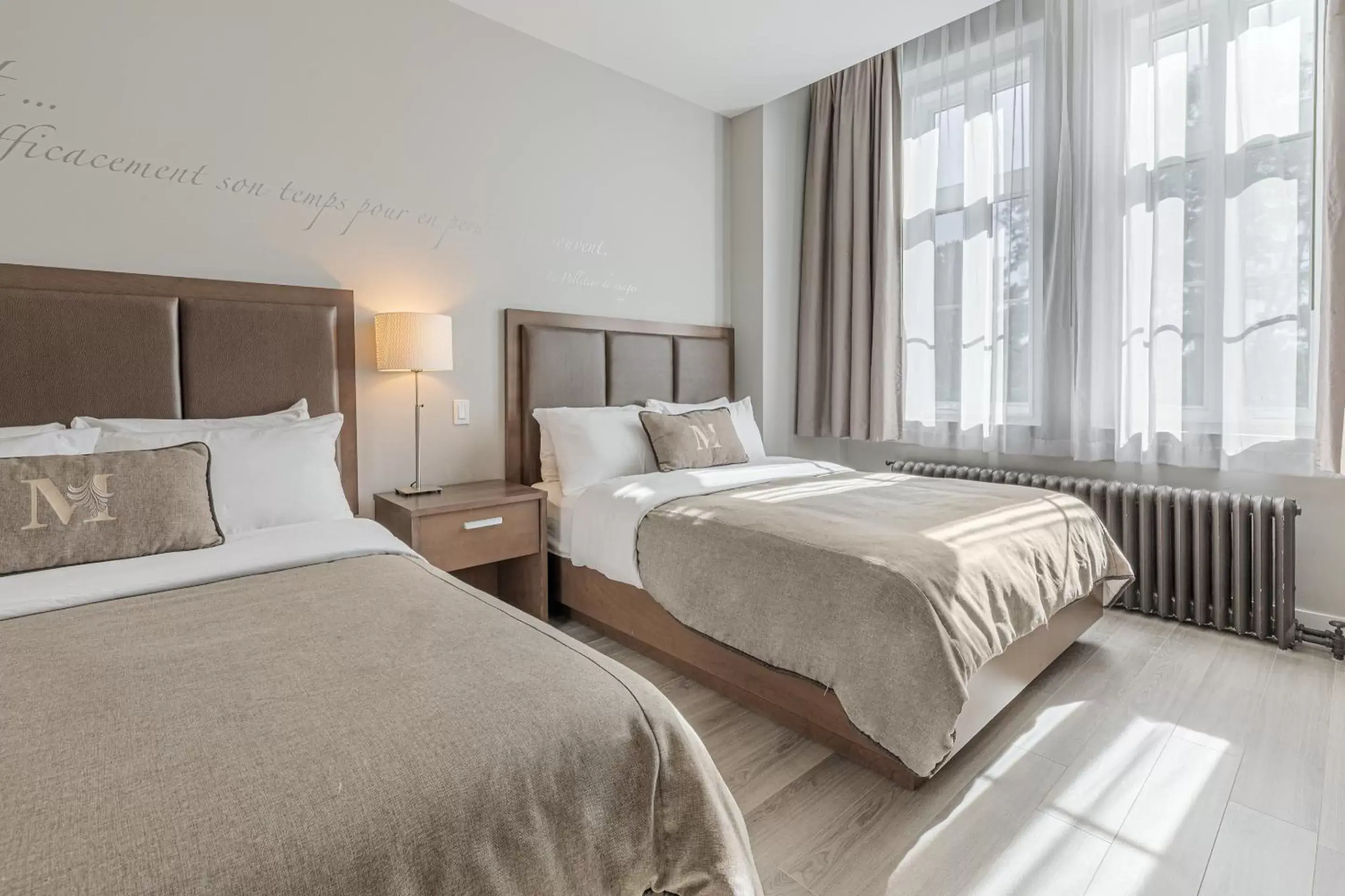 Deluxe Queen Room with Two Queen Beds in Hotel Montfort Nicolet Deluxe Queen Room with Two Queen Beds in Hotel Montfort Nicolet