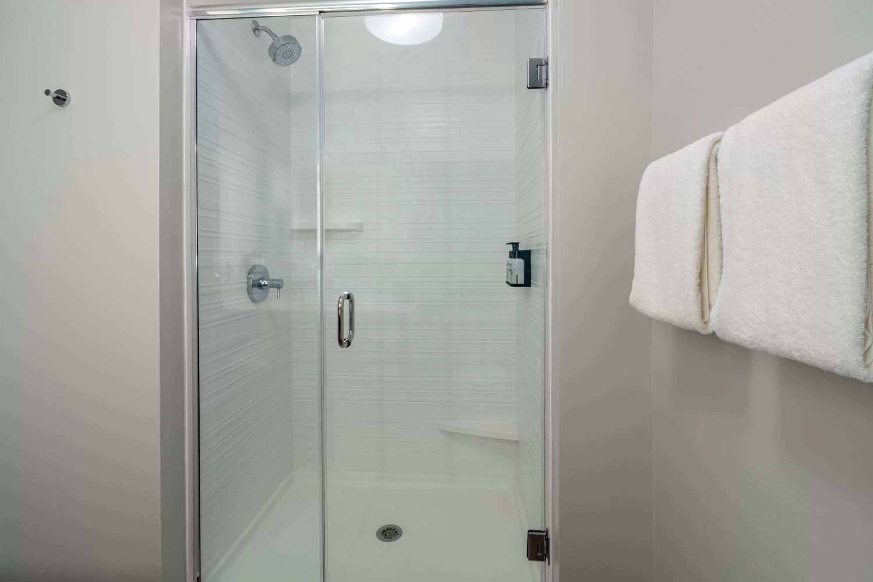 Bathroom in avid hotels Milwaukee West - Waukesha by IHG