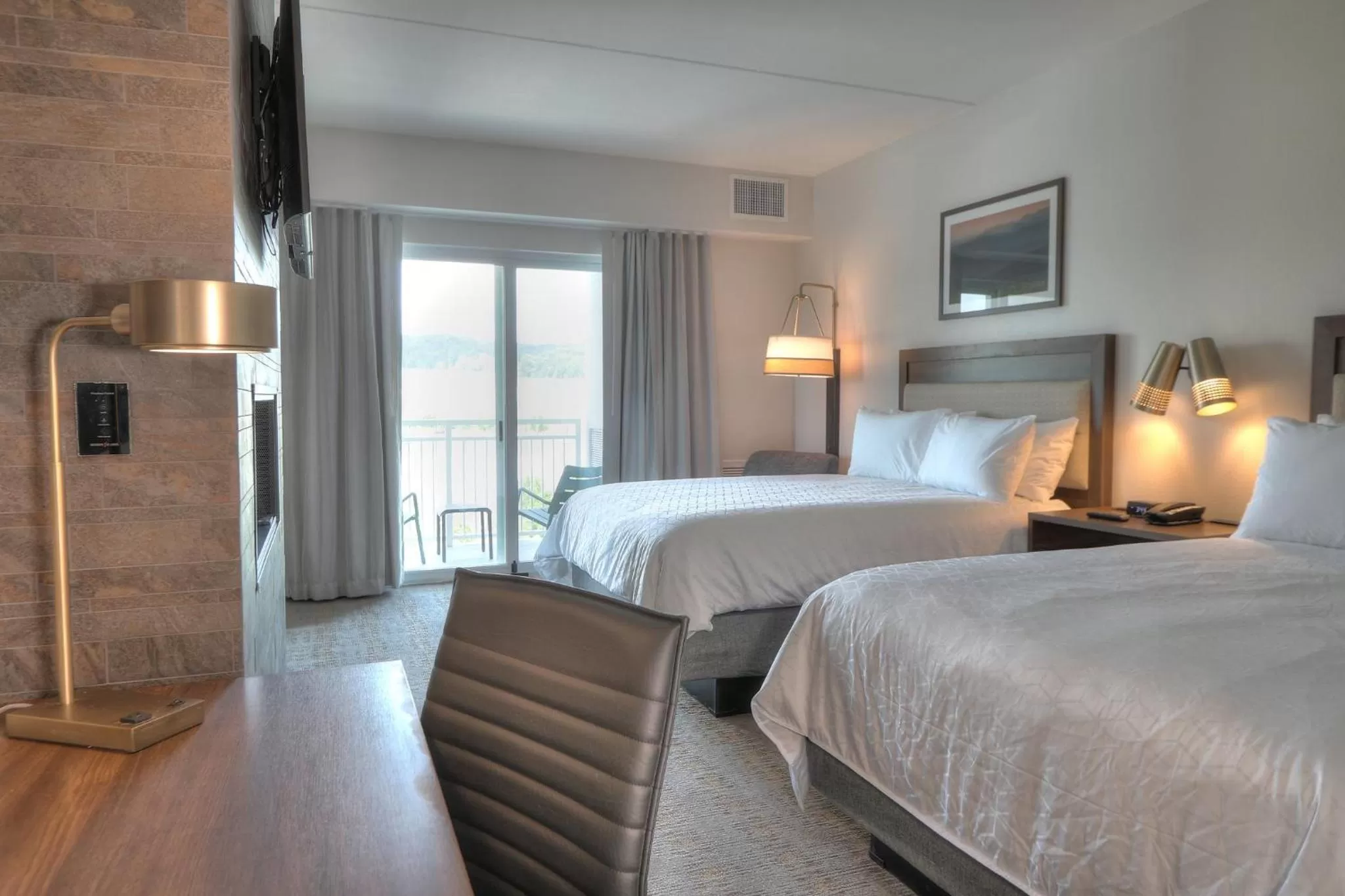 Photo of the whole room, Bed in Holiday Inn & Suites Pigeon Forge Convention Center by IHG