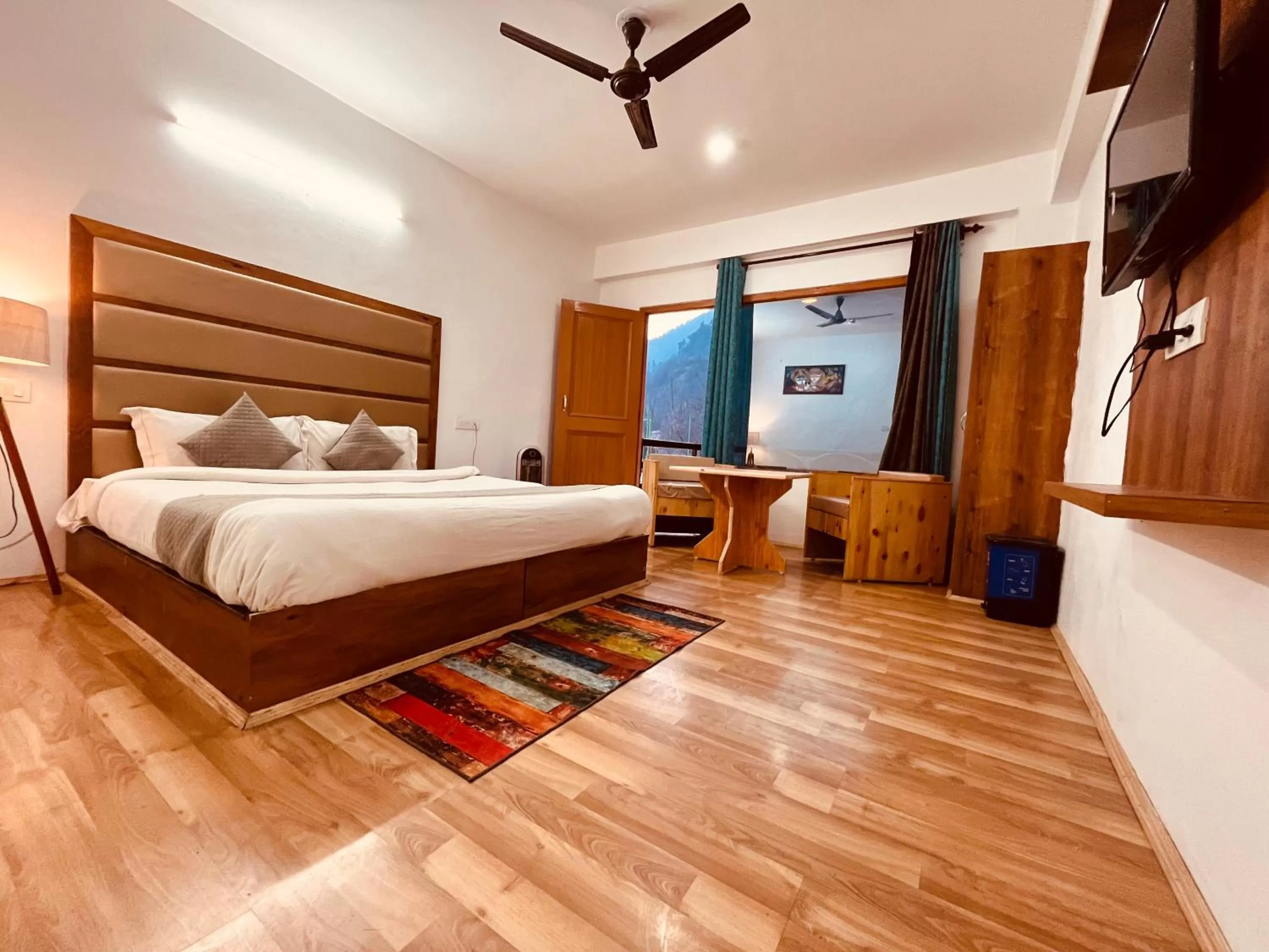 Bed in Himalayan Riverside Resort, Manali