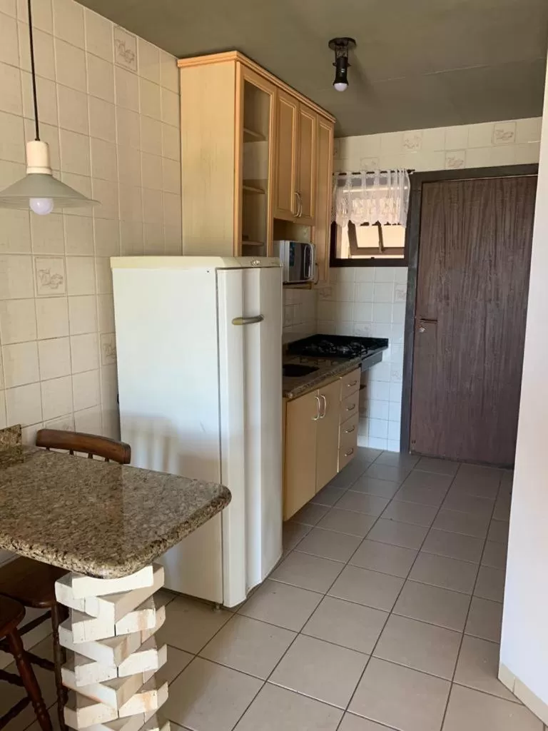 Kitchen/Kitchenette in Pousada Bangalôs Da Mole - Florianópolis