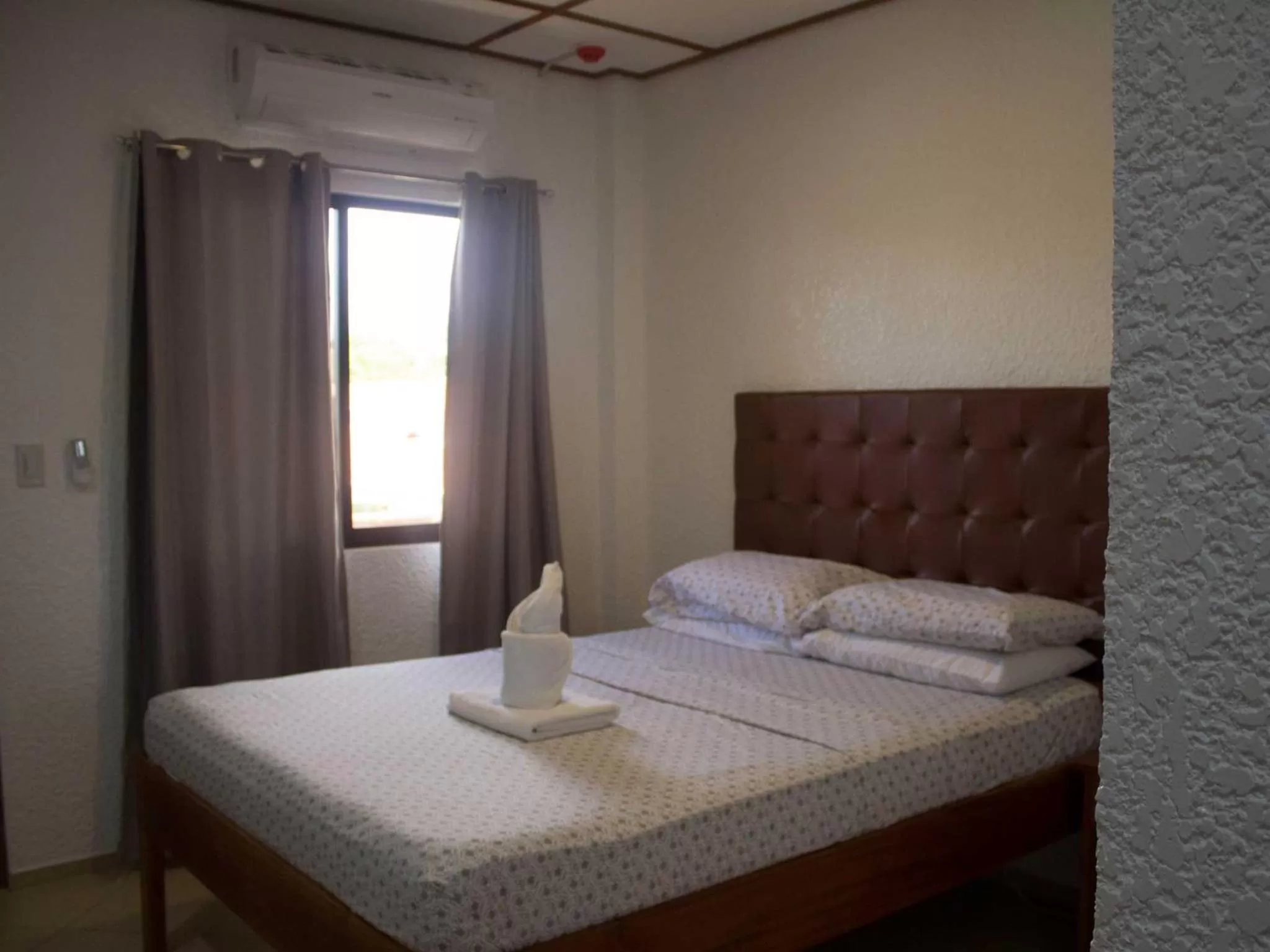 Bed in Jugalis Hotel and Restaurant