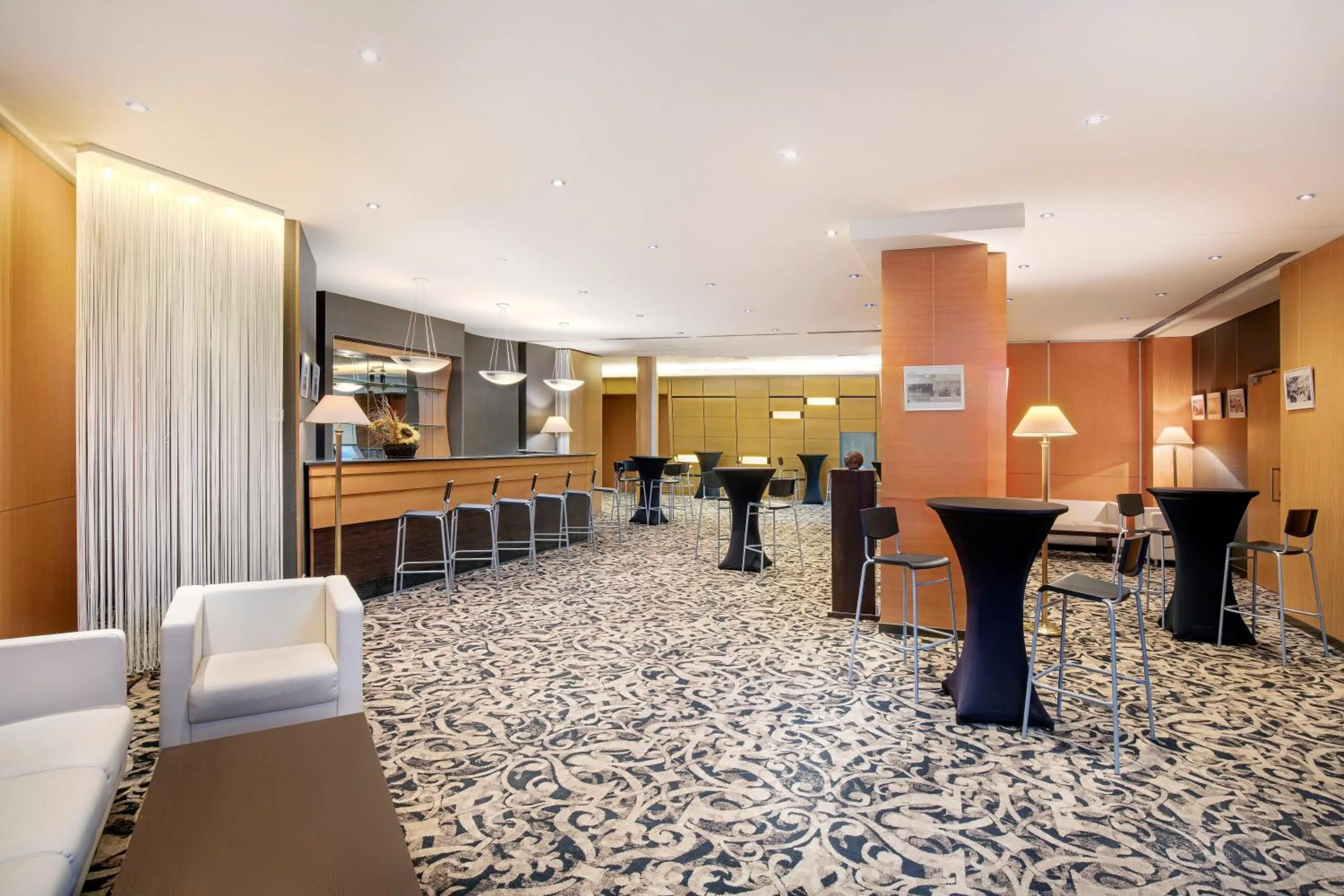 Lounge or bar in Crowne Plaza Bucharest by IHG