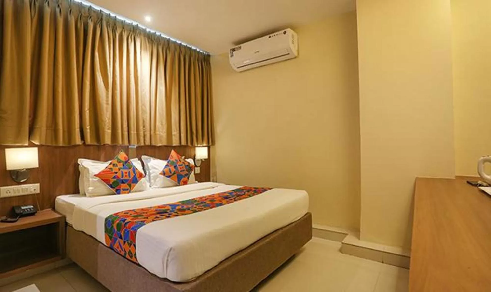 Bed in FabHotel Royal Mumbai International Airport