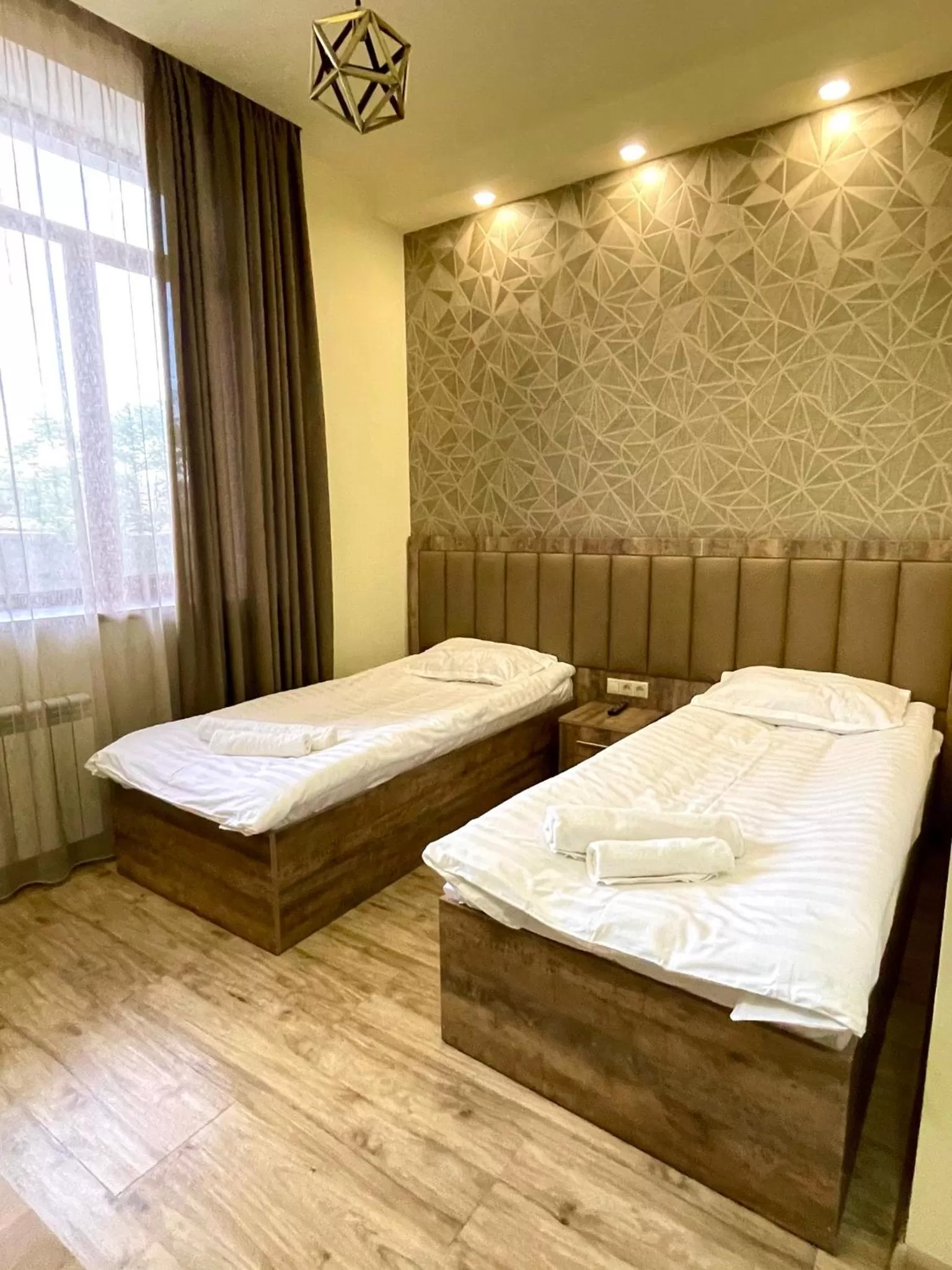 Bed in Glendale Boutique Hotel