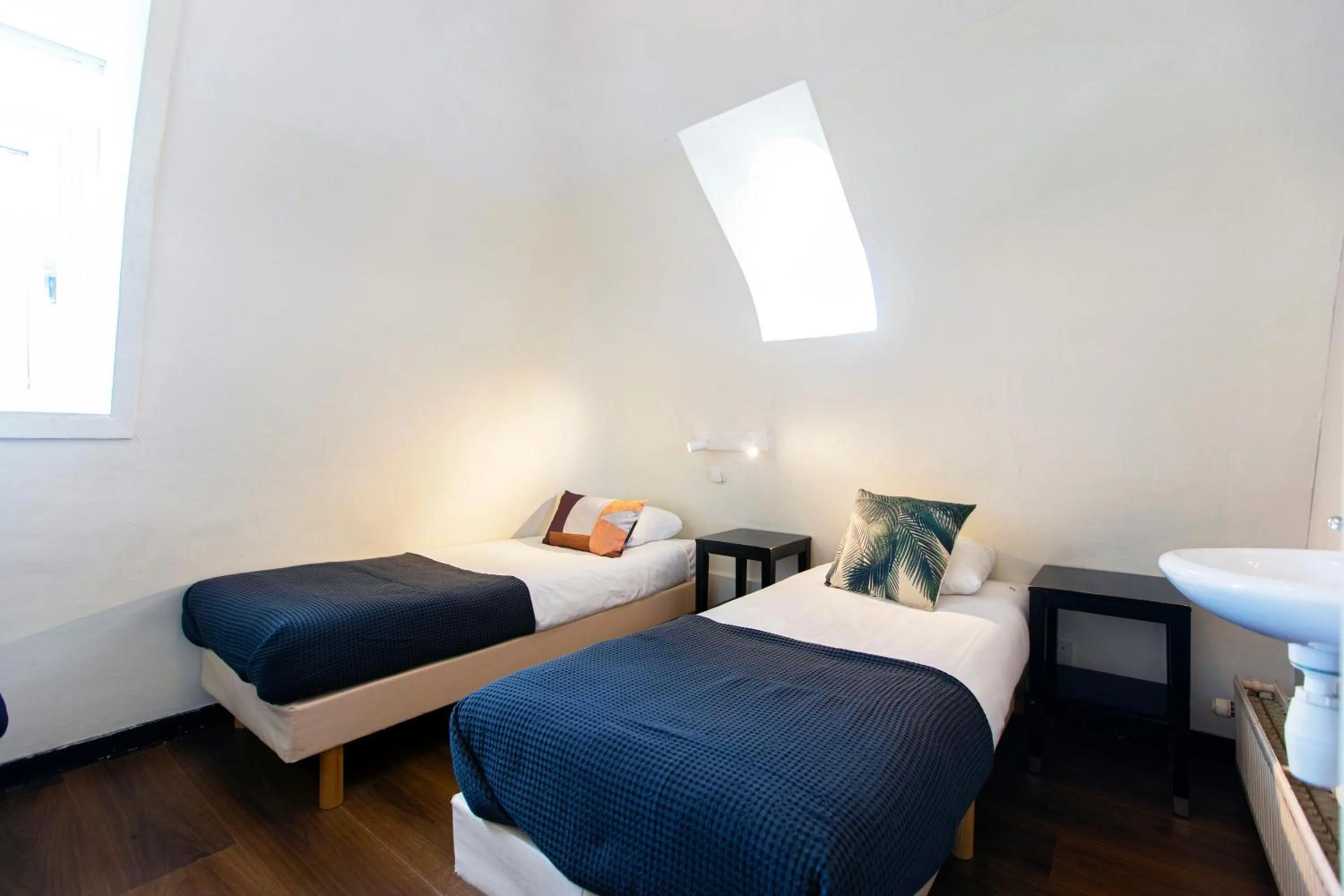 Bed in Quentin Arrive Hotel