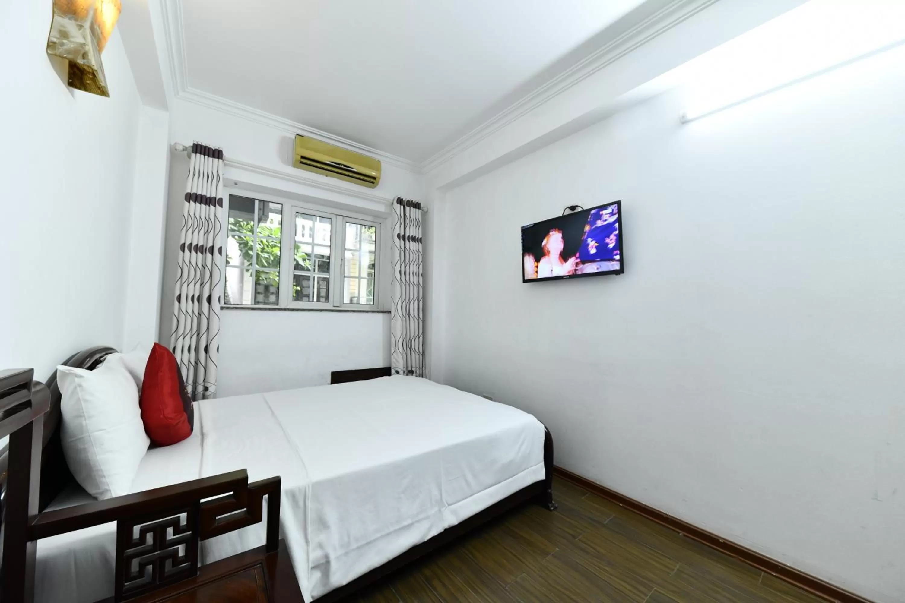 Bed in Phoenix Legend Hotel Hanoi