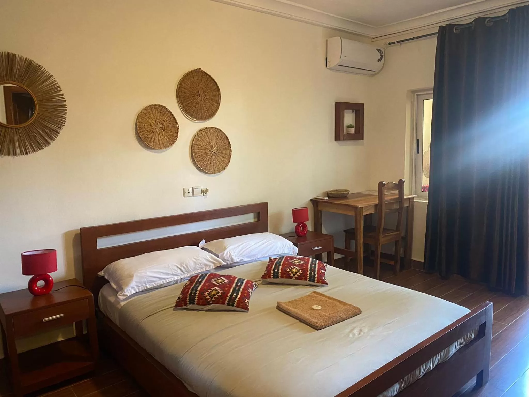 Bed in L'Oasis Guesthouse