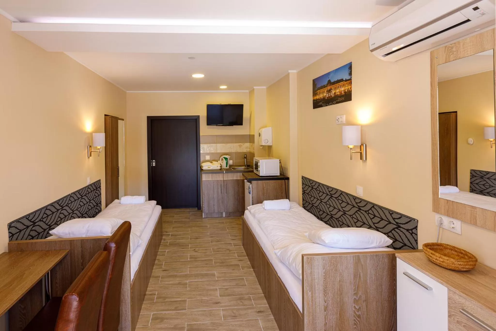 Bed in Central Panzió Gyula