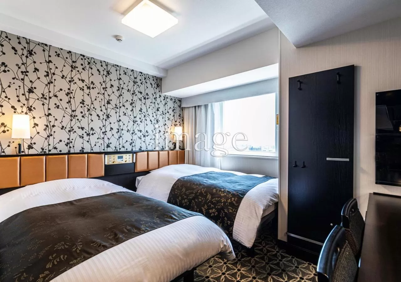 Photo of the whole room, Bed in APA Hotel & Resort Niigata Ekimae Odori
