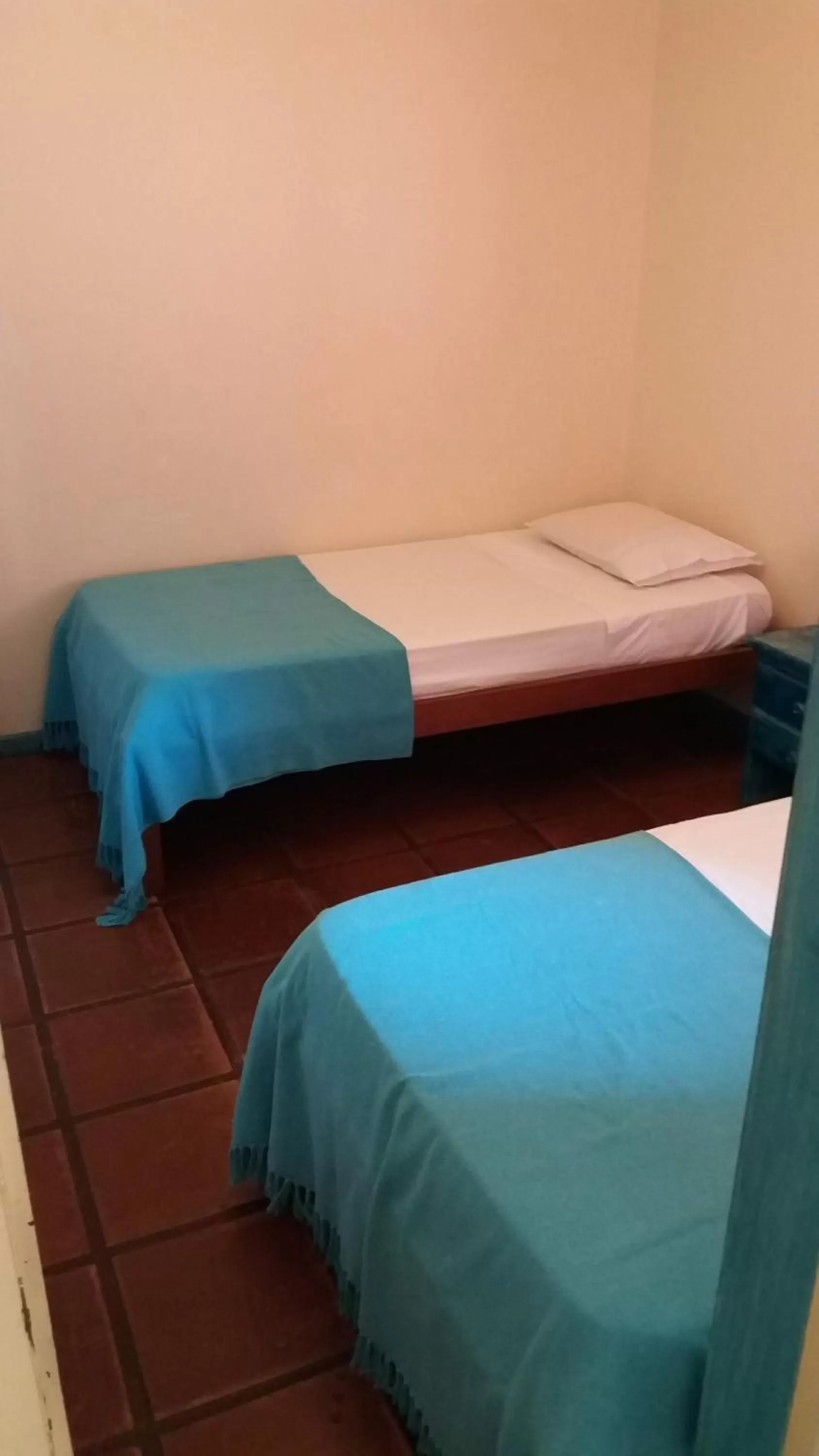 Bed in Pousada L'escale