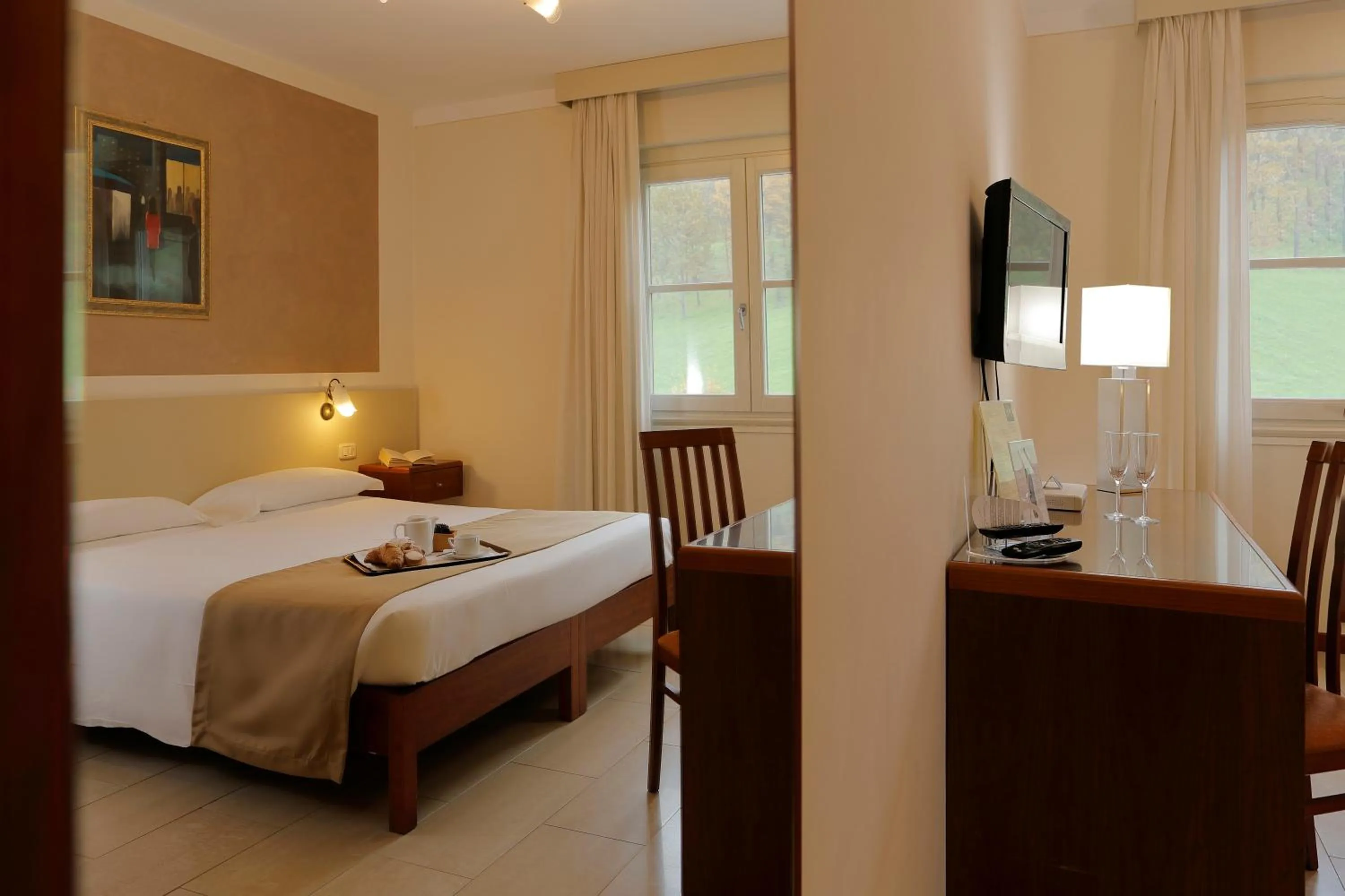 Bed in Hotel Michelangelo