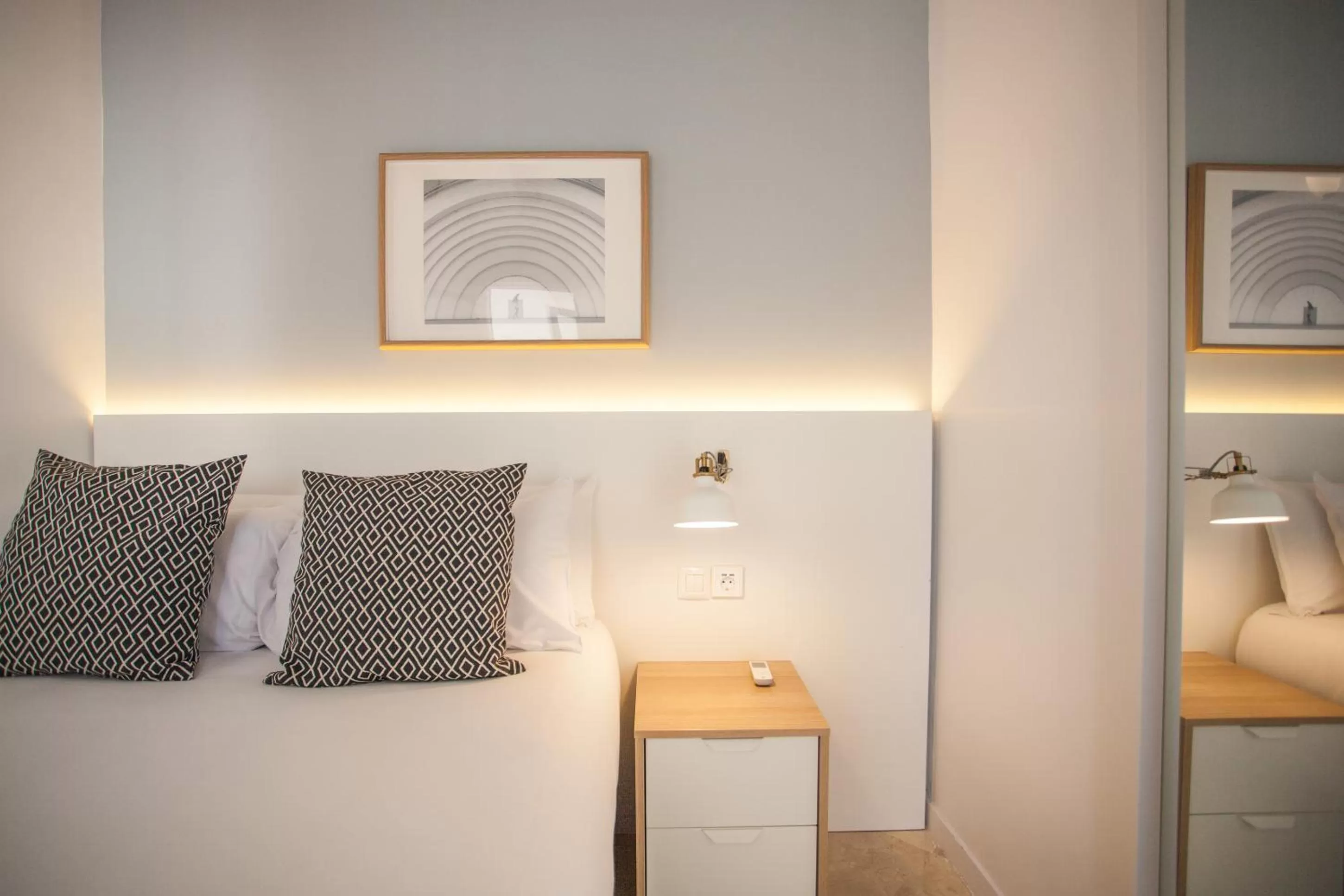 Bed in Gran Central Suites