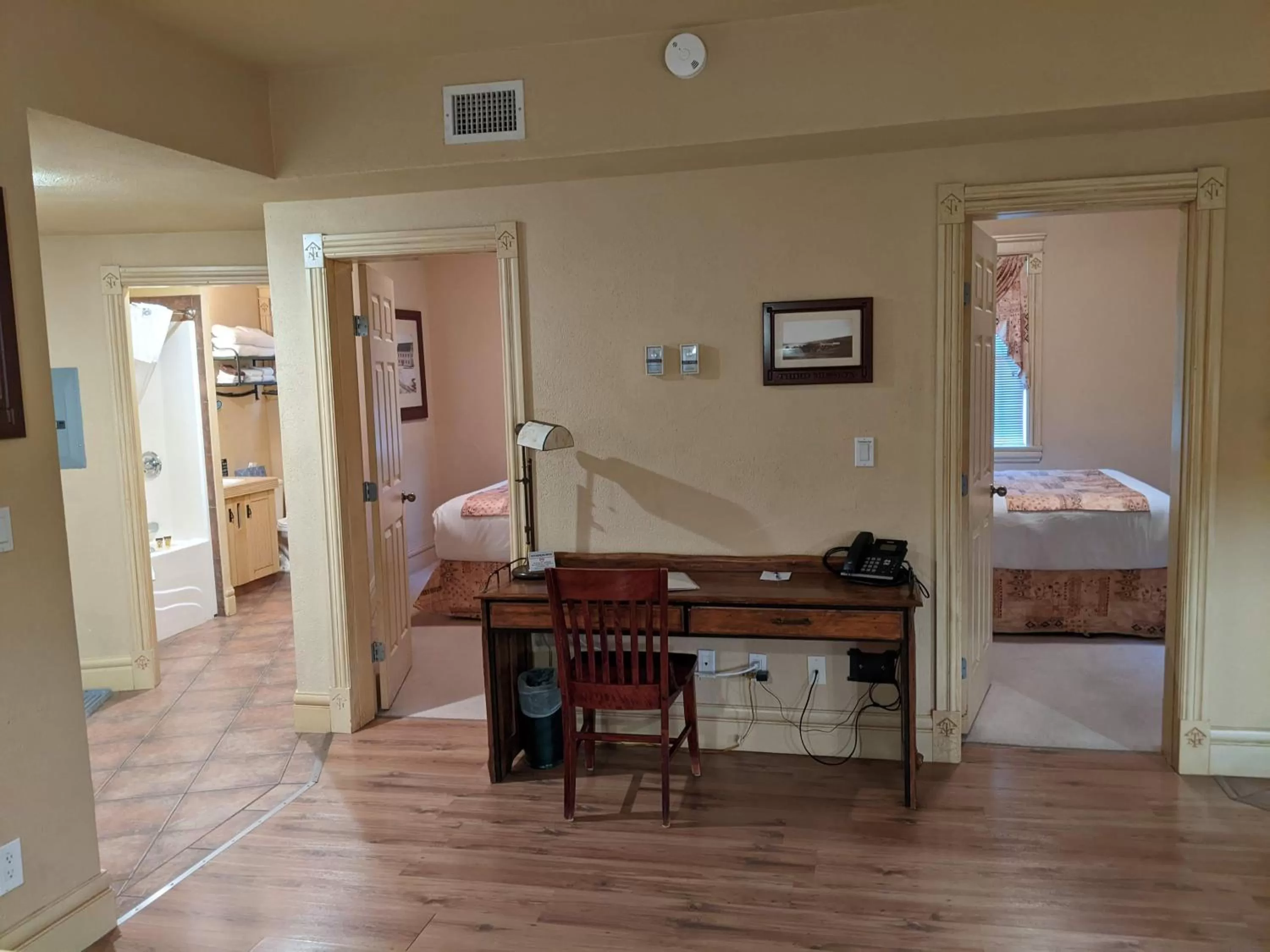 Bathroom, Bed in Third Mission Heritage Suites