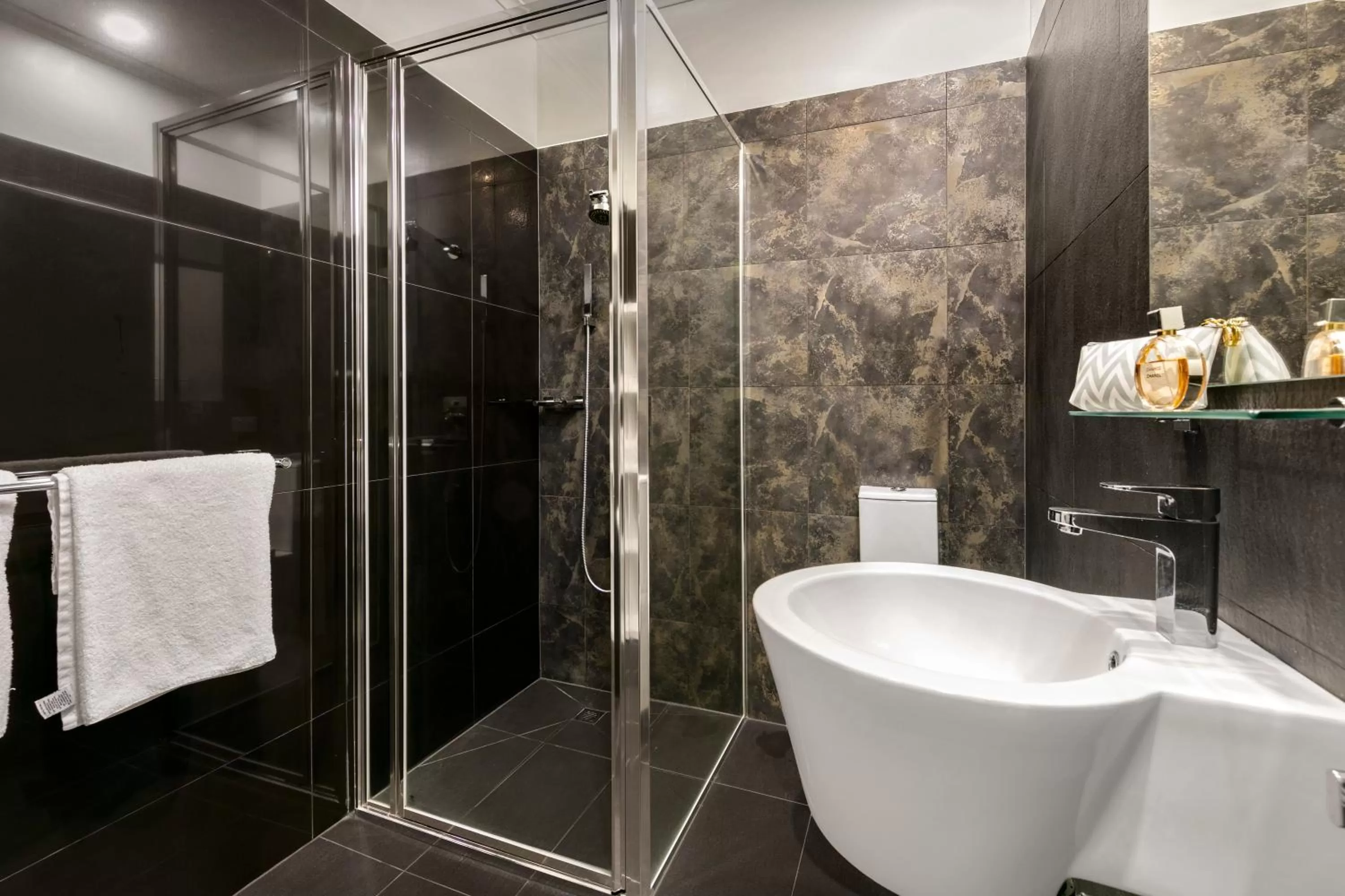 Bathroom in Quest Savoy