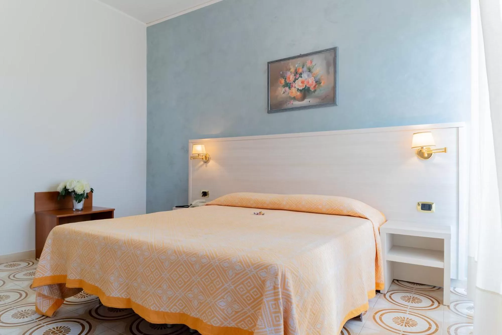 Bed in Hotel Riviera