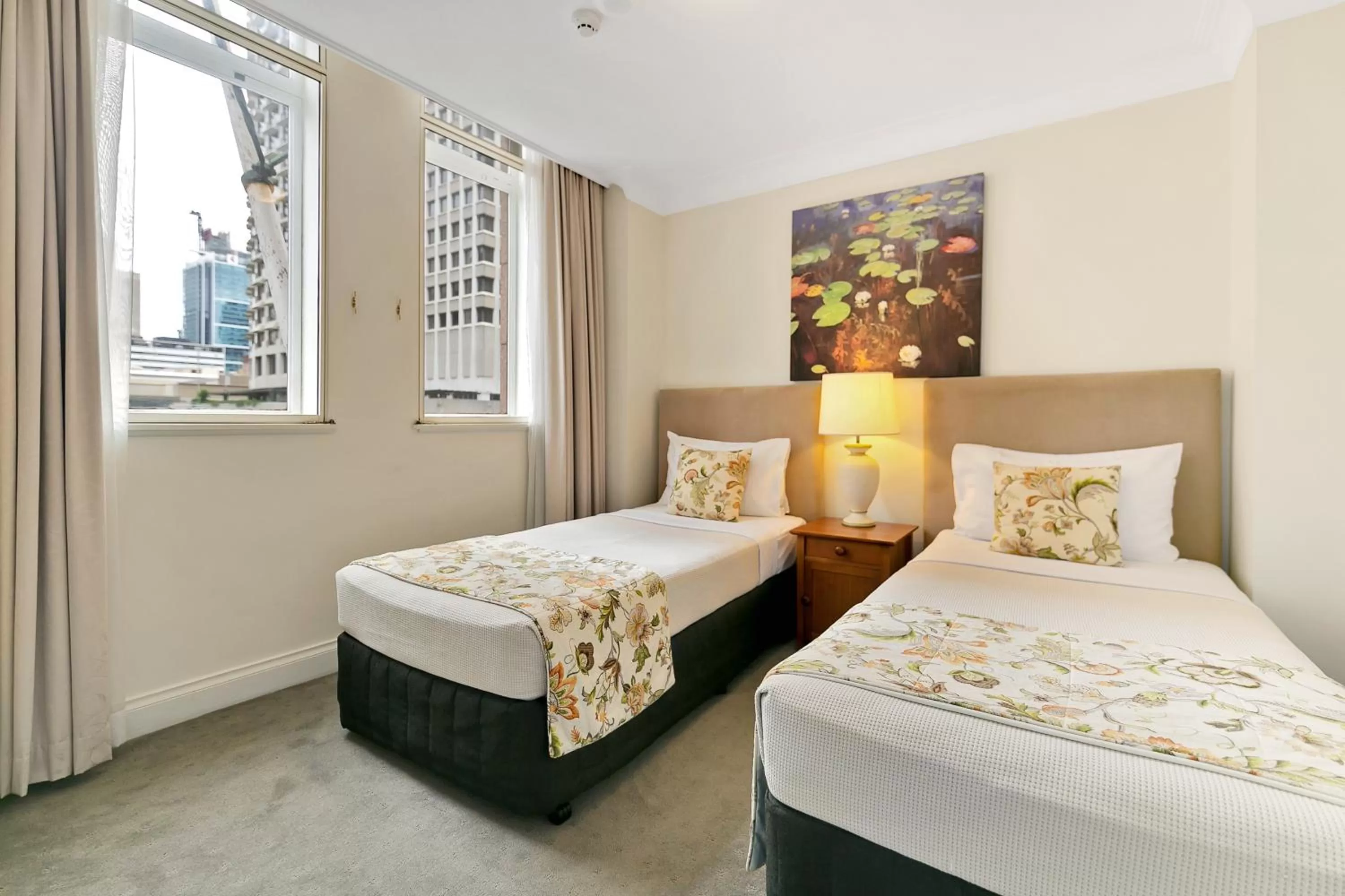 Bed in Manor Apartment Hotel