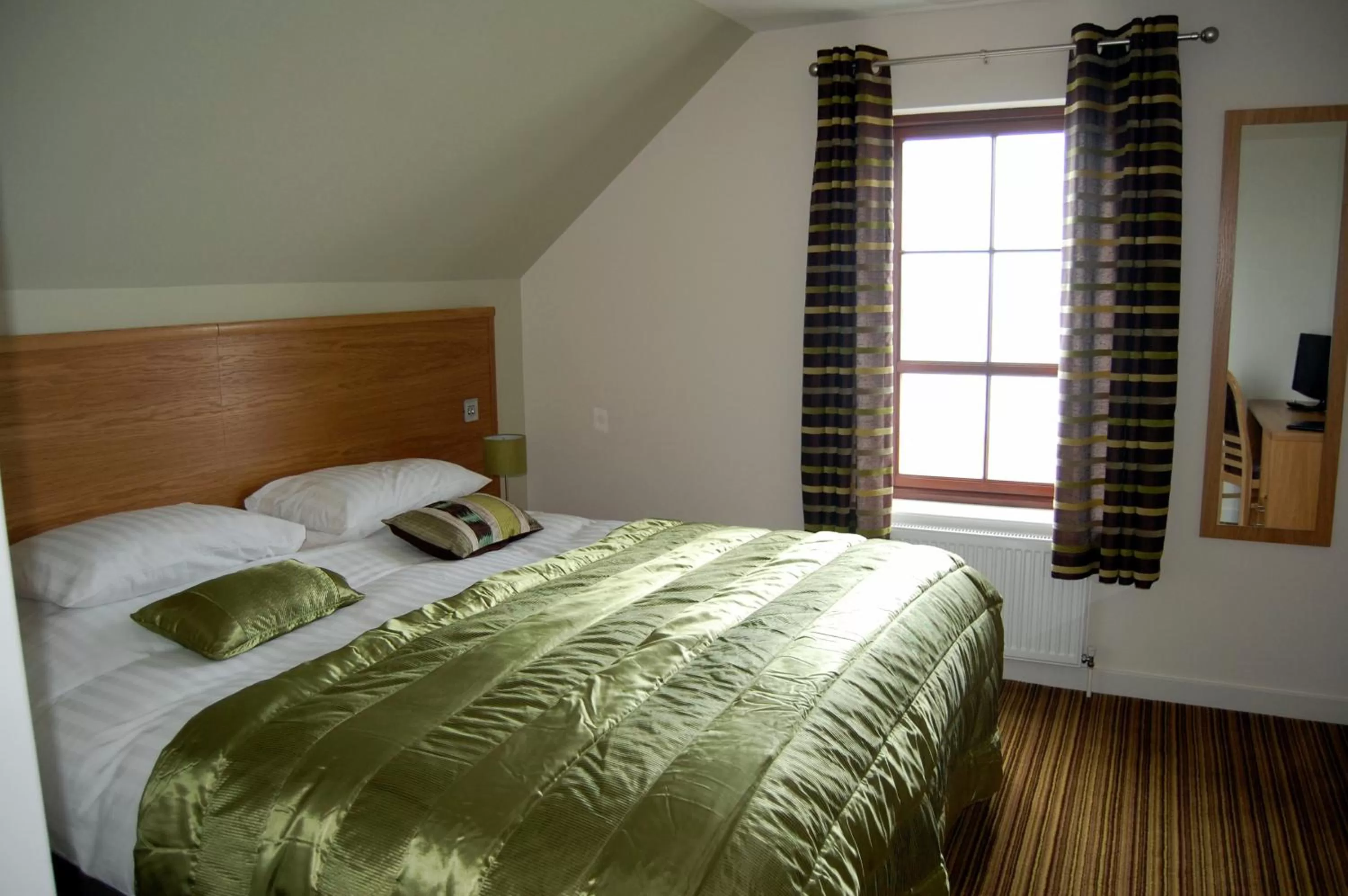 Bed in Ayre Hotel & Ayre Apartments